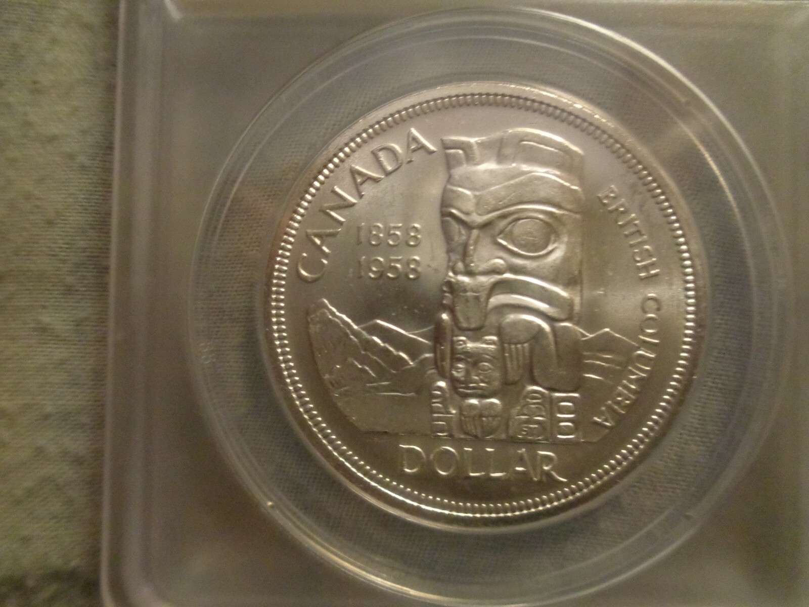 1958 canadian dollar graded ms 63 by anacs.