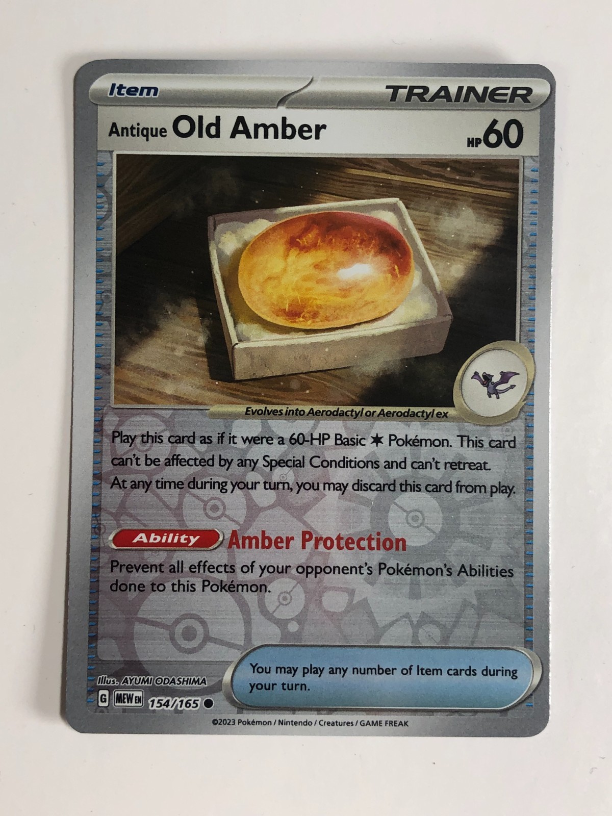Pokemon TCG 151 Reverse Holographic Antique Old Amber 154/165 Near Mint