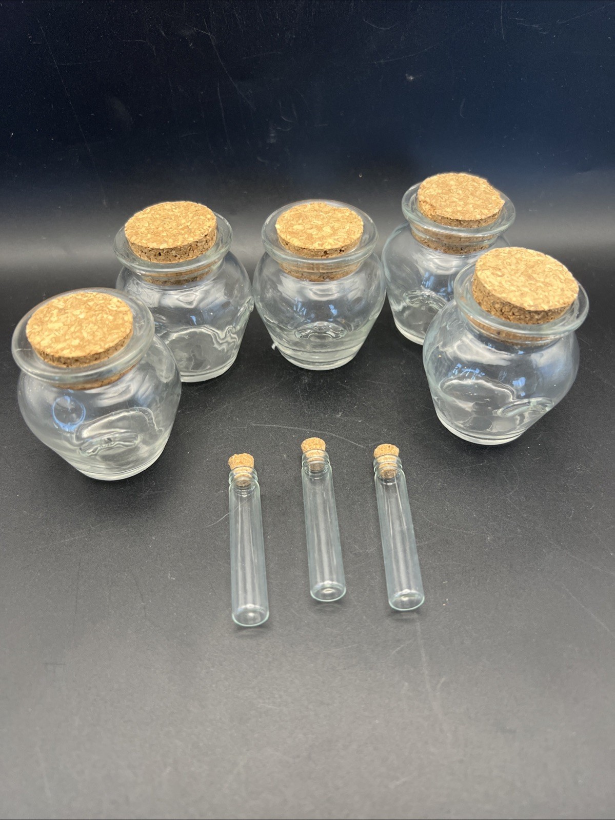5 Clear Glass Round Jars And 3 Vials With Stoppers