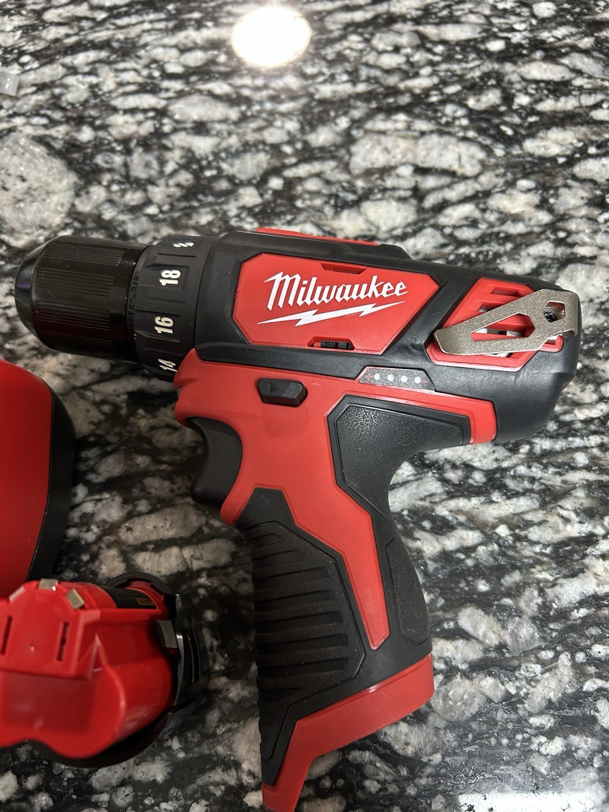 Milwaukee drill, battery, and charger