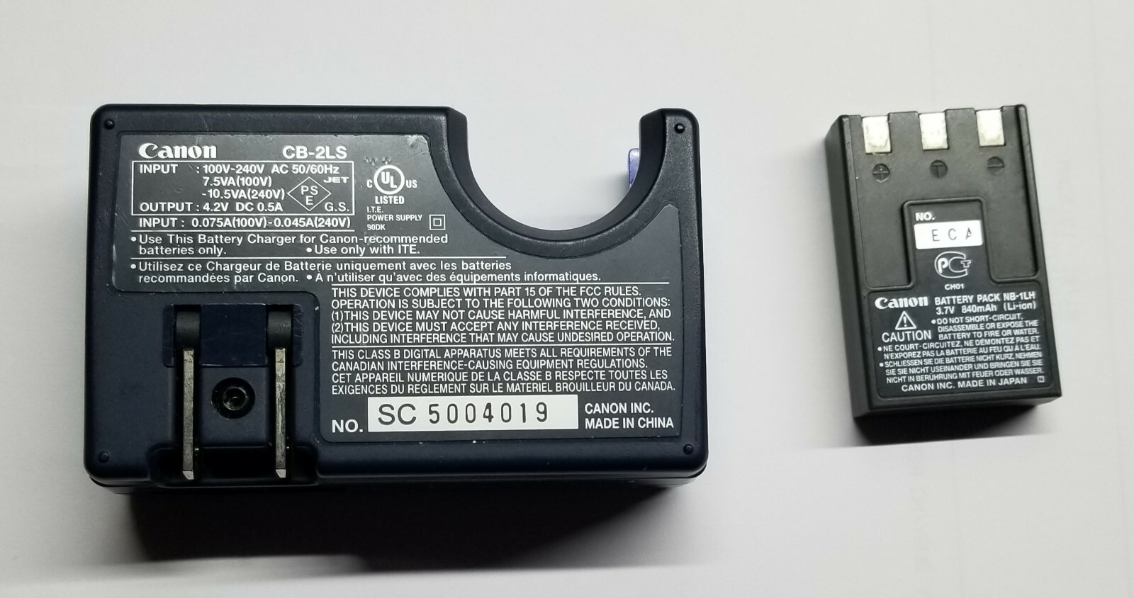 Canon CB-2LS battery charge+Battery CH01 +Software (Version 17.1-Windows and Mac