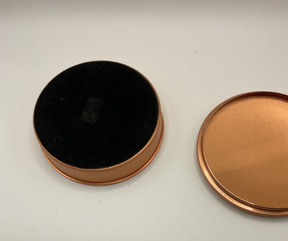 Copper lidded box from Greece 4” in diameter.