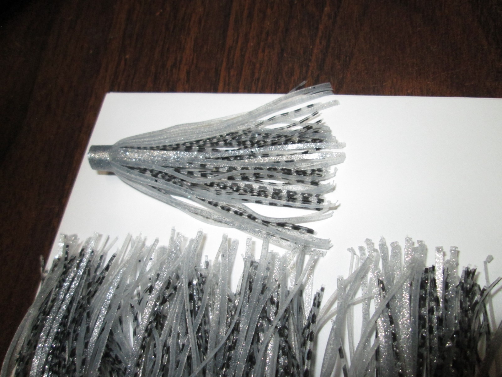 25 - QUICK CHANGE SILICONE RUBBER SKIRTS - 3" LONG - SILVER AND BLACK,,