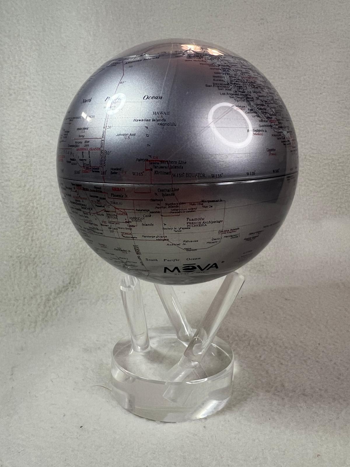 Mova Solar Powered Rotating World Globe 4.5" Silver with Red Lettering
