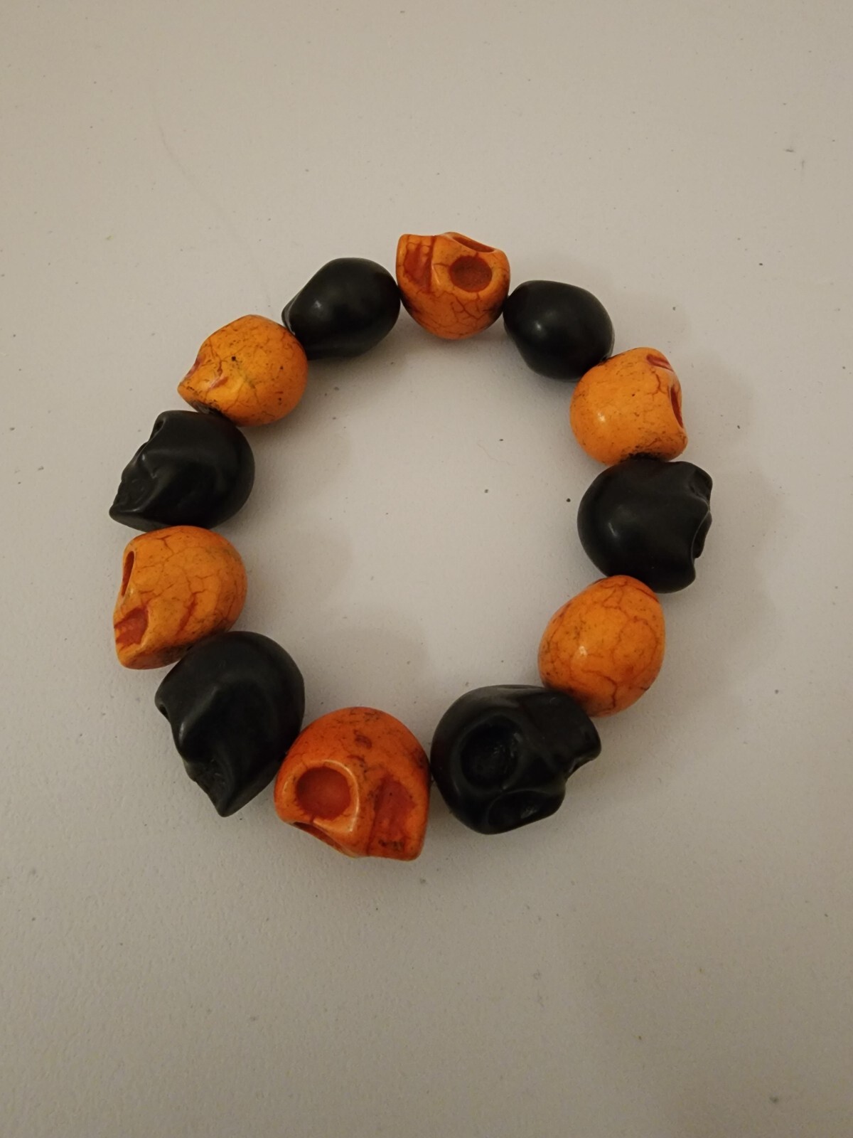 Large Black and Orange Magnesite Skull Bead Bracelet Elastic