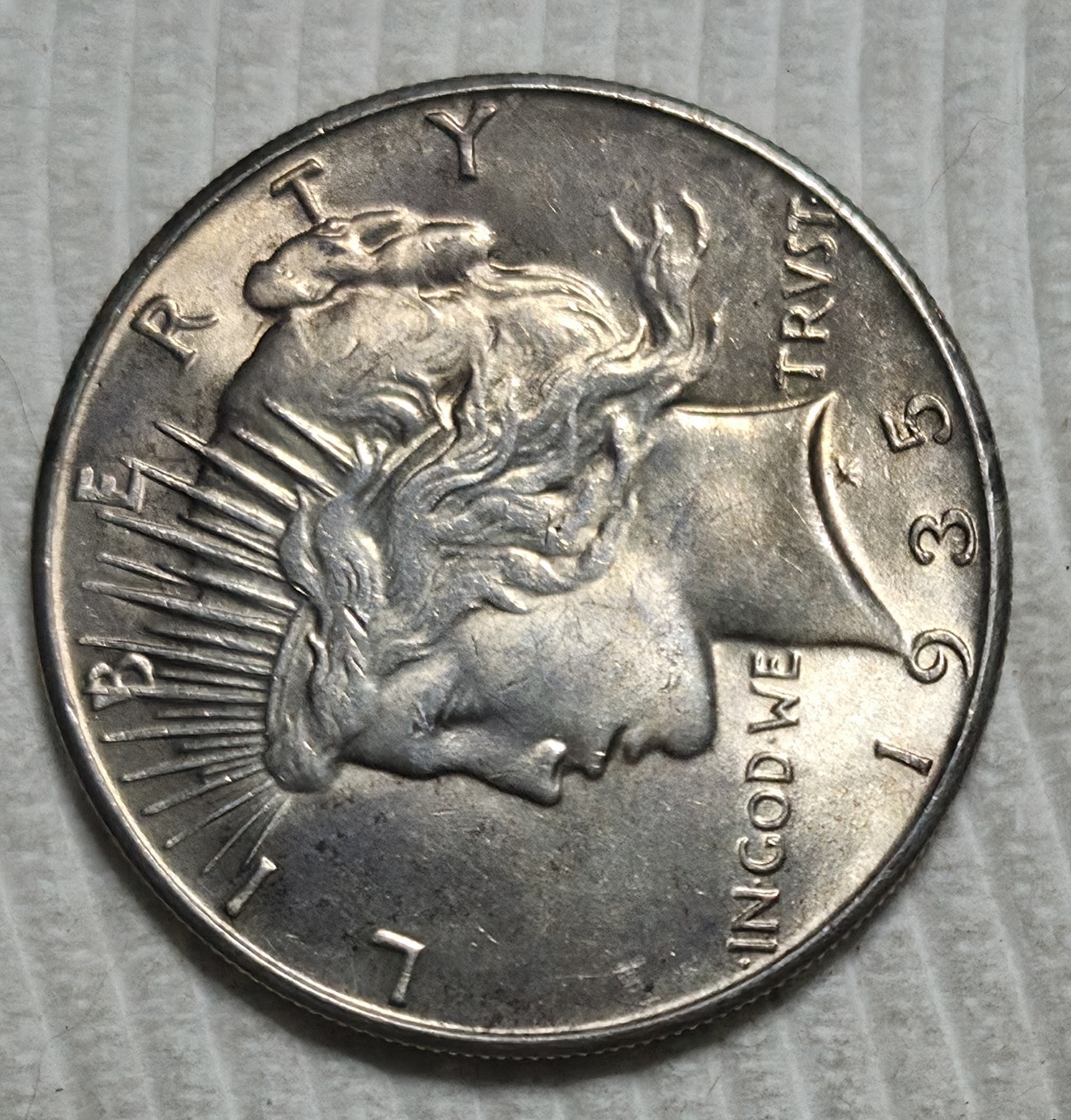1935 P Peace Silver Dollar. Estimated Almost Uncirculated 58. A0989.