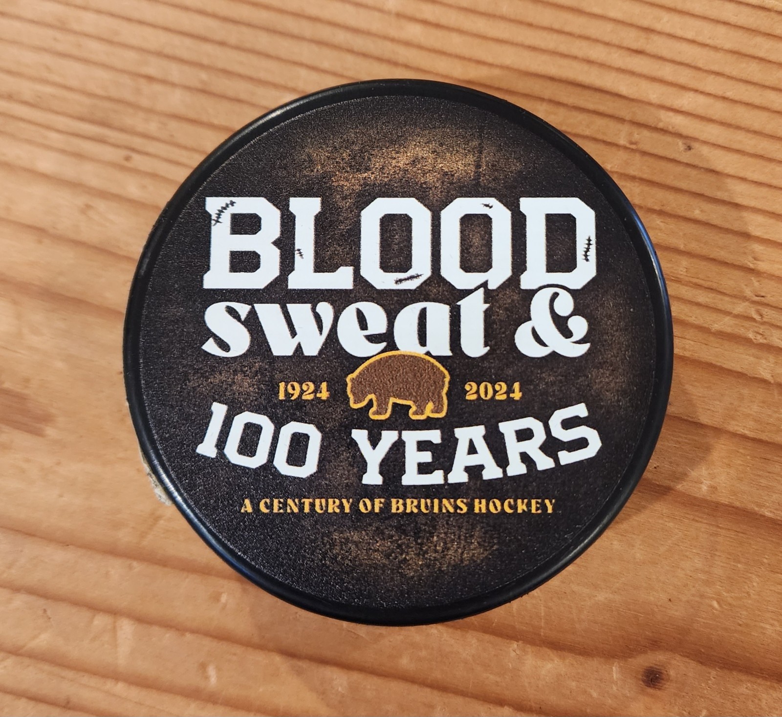 Boston Bruins Logo Hockey Puck Blood Sweat & 100 Years Centennial