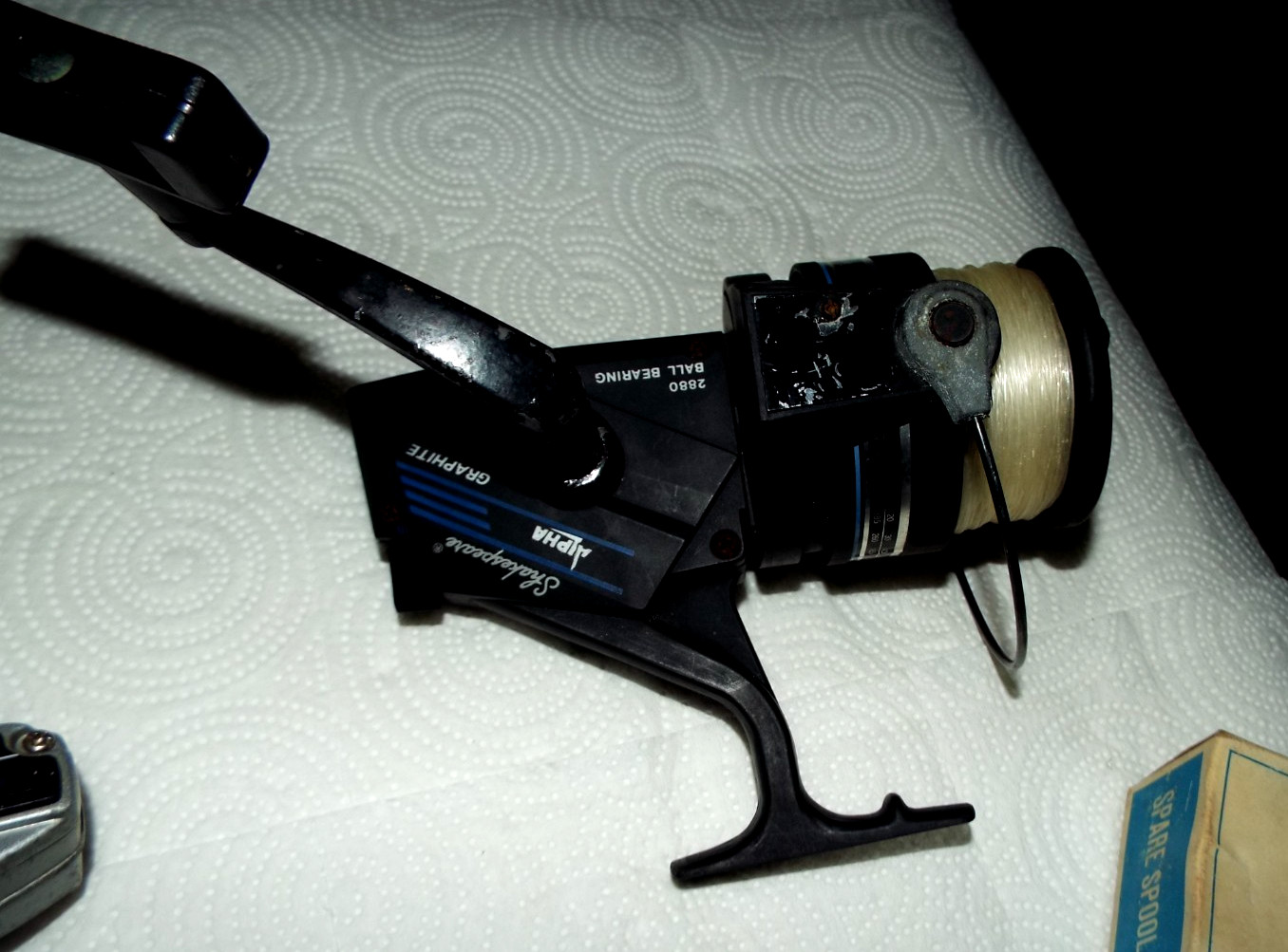 7 VINTAGE FISHING REELS WITH SOME EXTRA SPOOLS GARCIA, QUANTAM ETC.... READ!!!