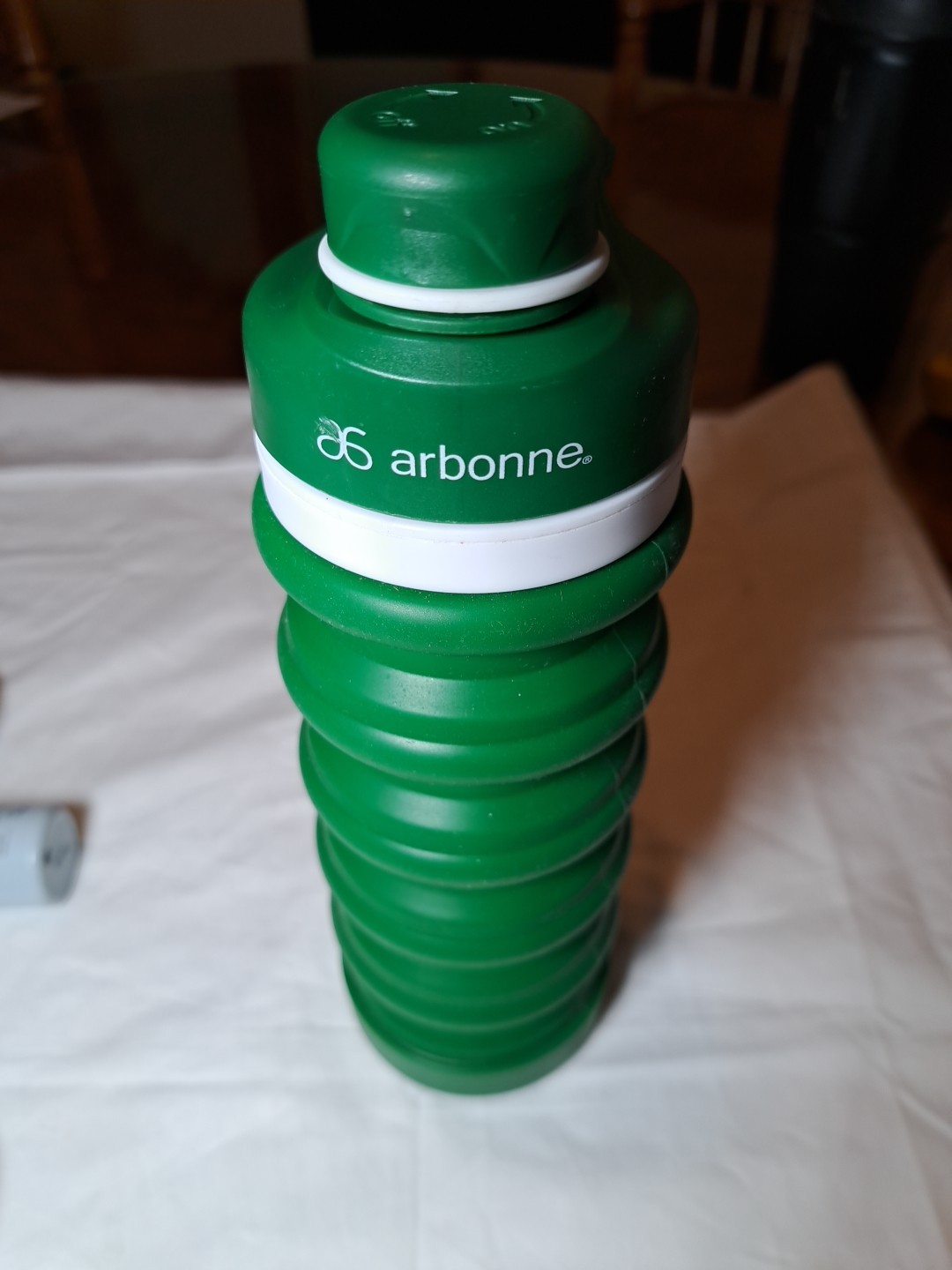 New Arbonne Collapsible Silicone Green Bottle New