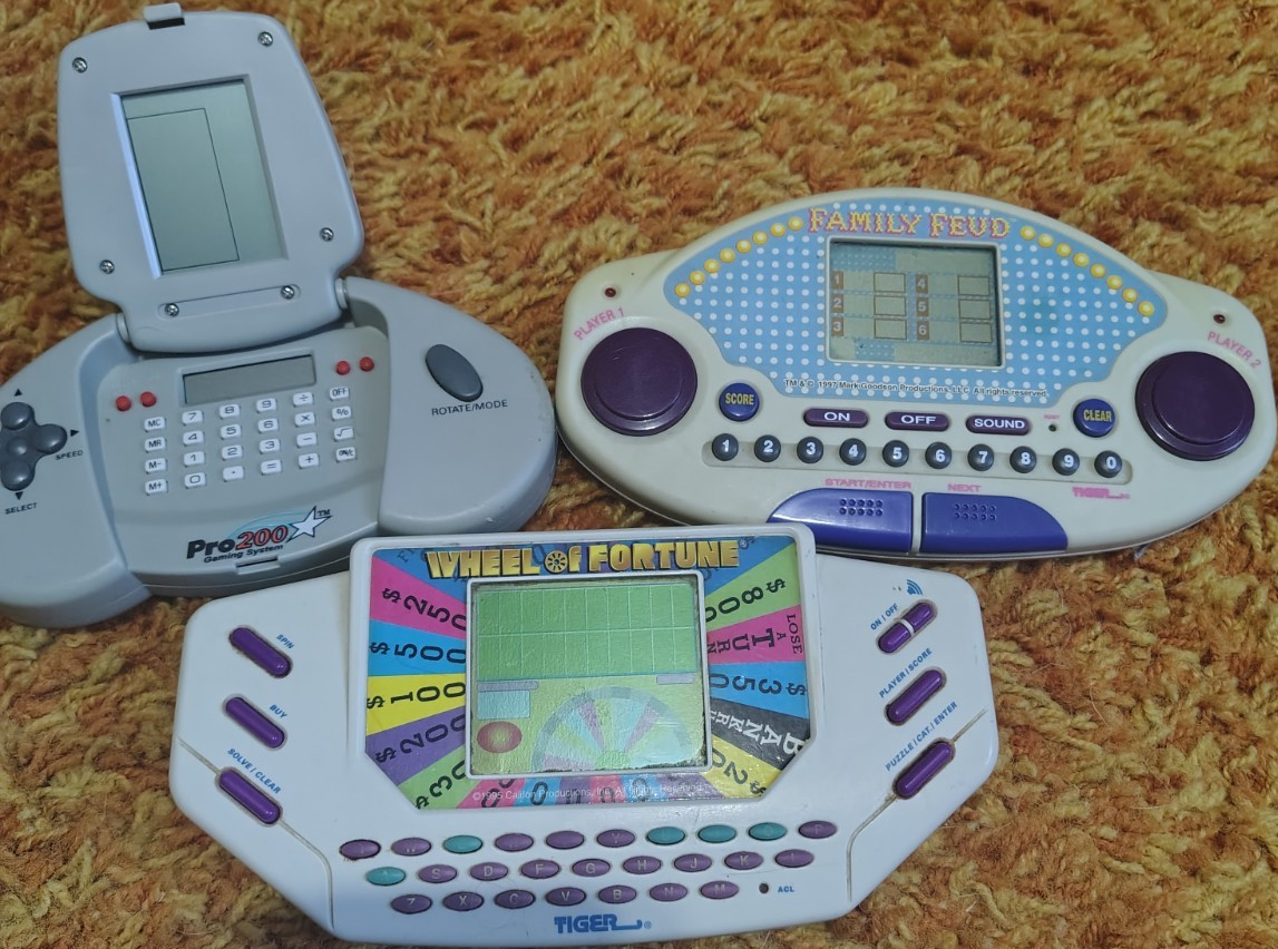 Tiger Handheld Electronic Games Wheel of Fortune Family Feud Pro 2000 Lot of 3