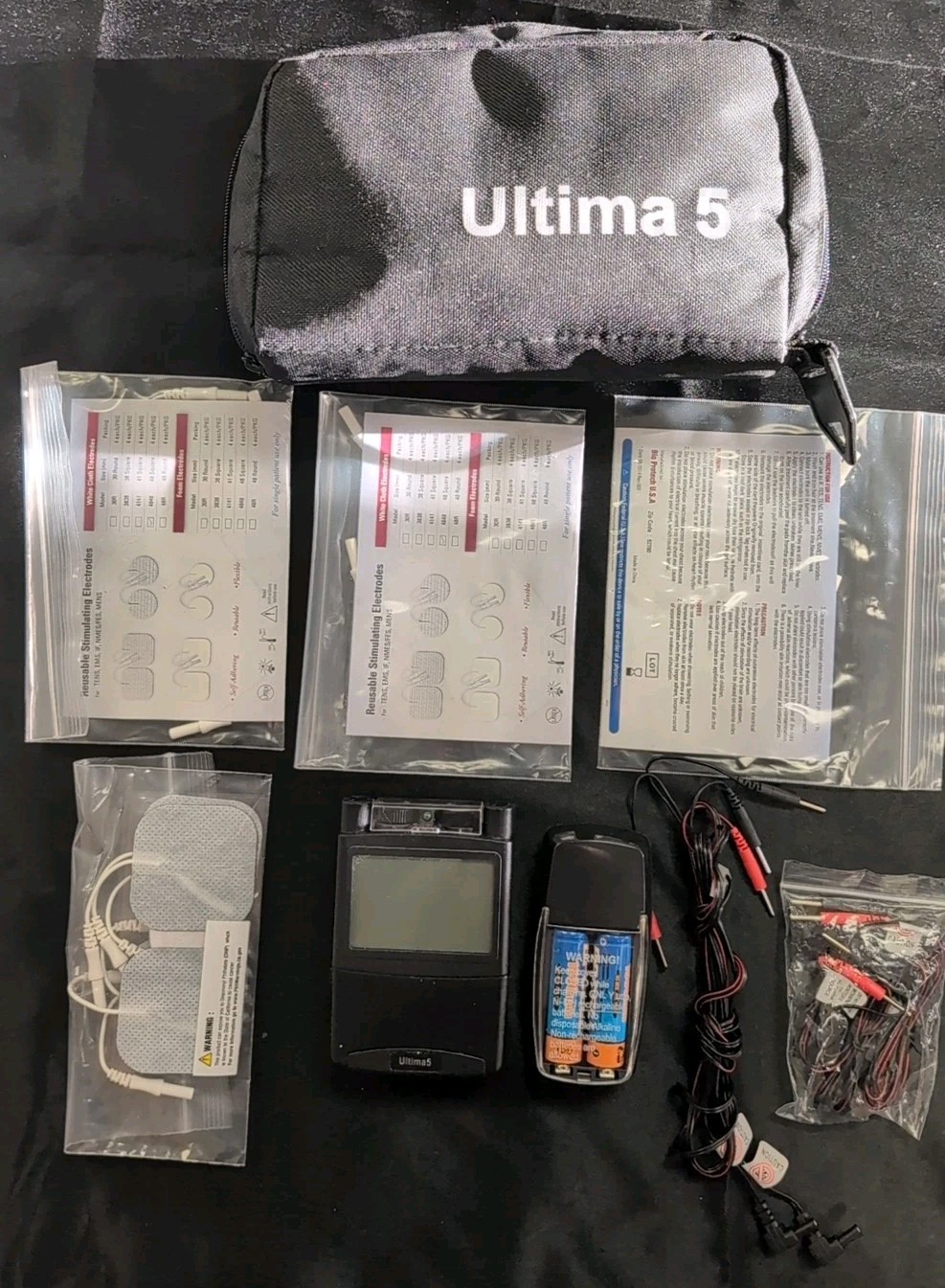 Ultima 5 Digital TENS /Wks Grt/ Batery Charger/ 4 Pads/ 2 Signa Spray Bottles