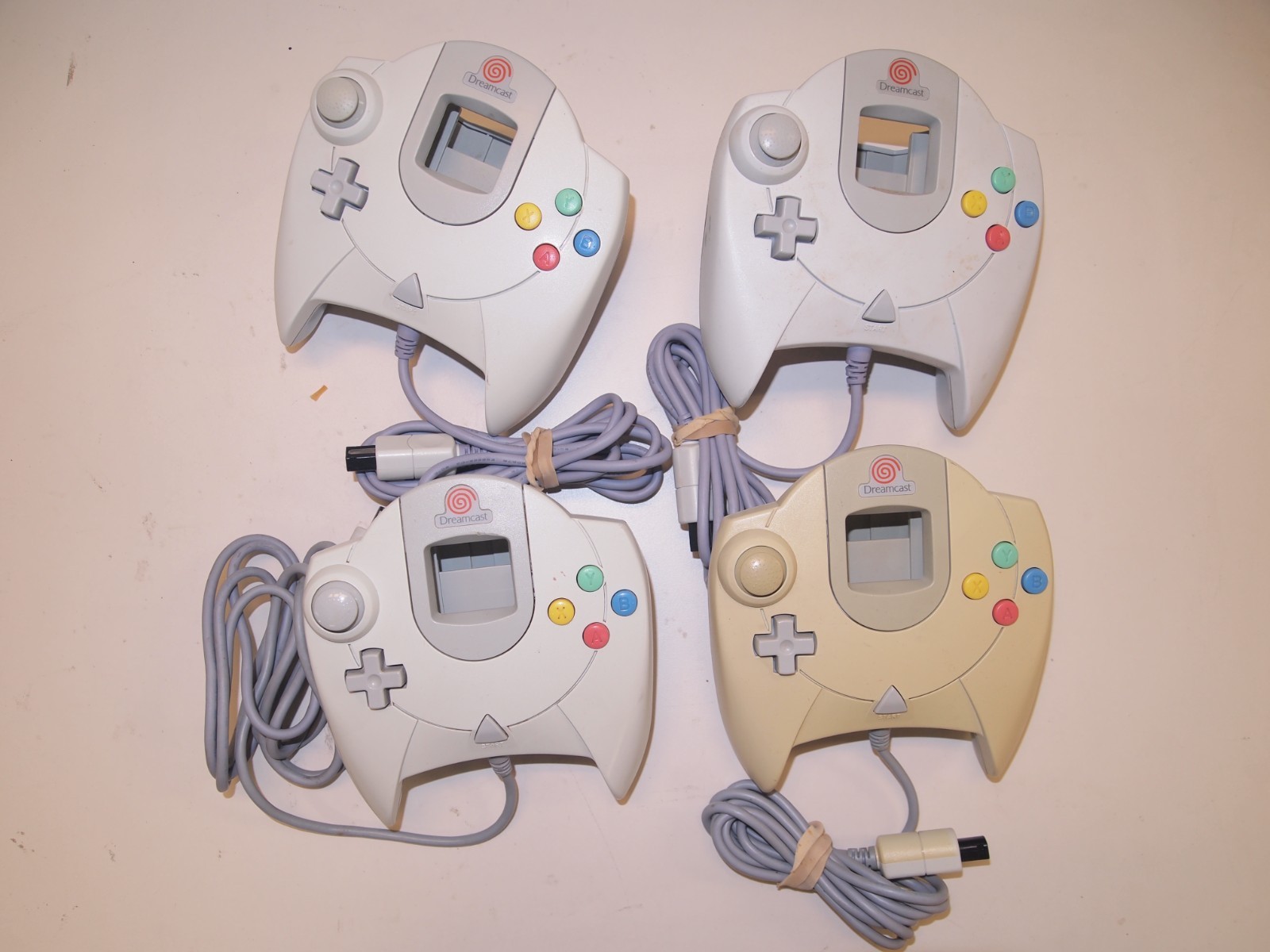 Lot of 4 Authentic OEM Sega Dreamcast Controllers For Parts/Repairs
