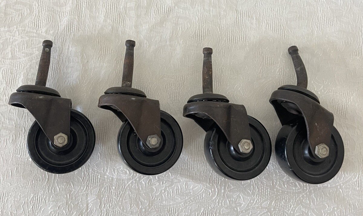 Vintage Heavy duty Replacement Caster Wheels Set of 4 (One Is Bent )