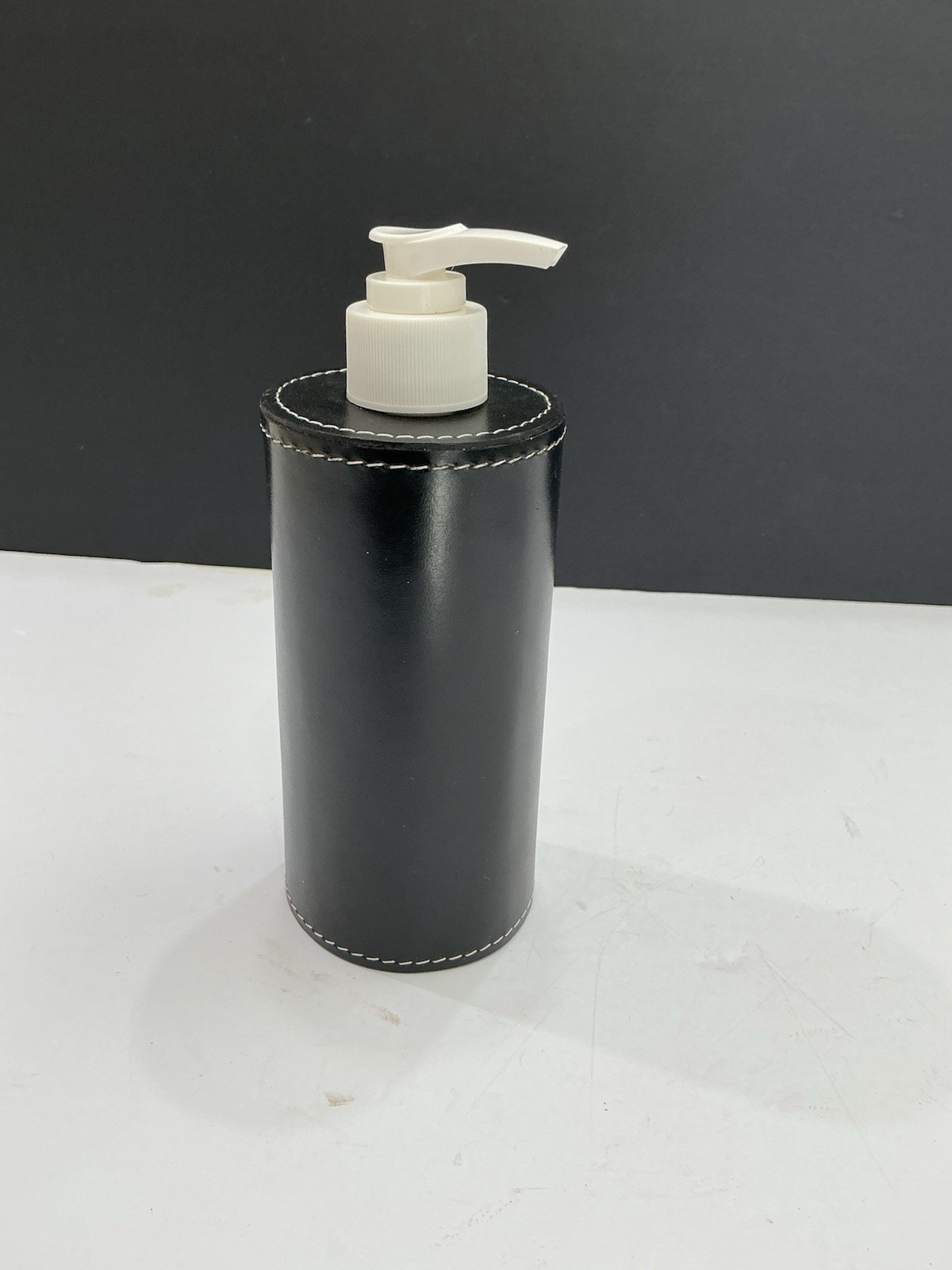 Black Leather Sleeve And Soap Dispenser