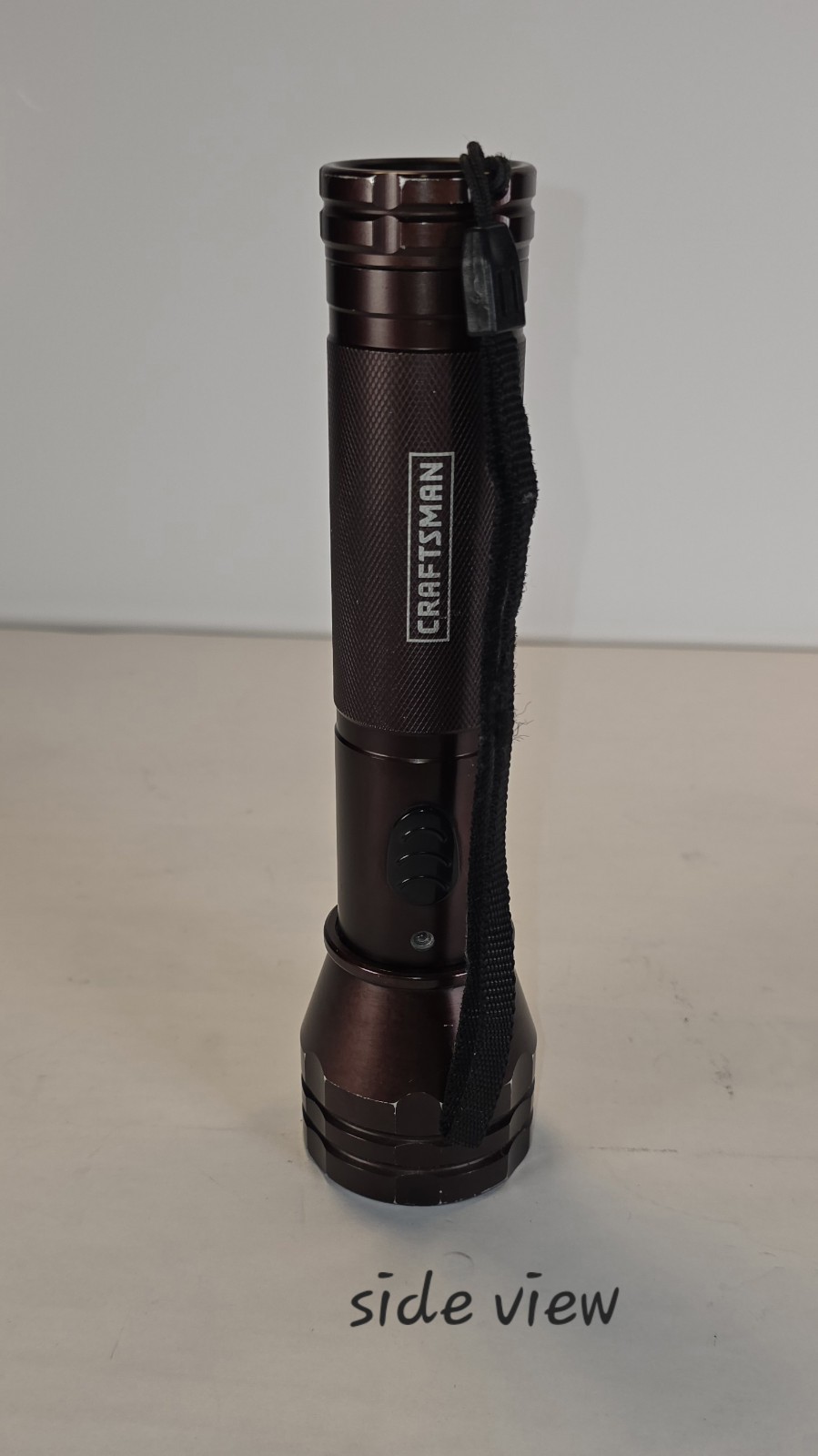 Craftsman flashlight aluminum body chocolate brown AA battery includes strap