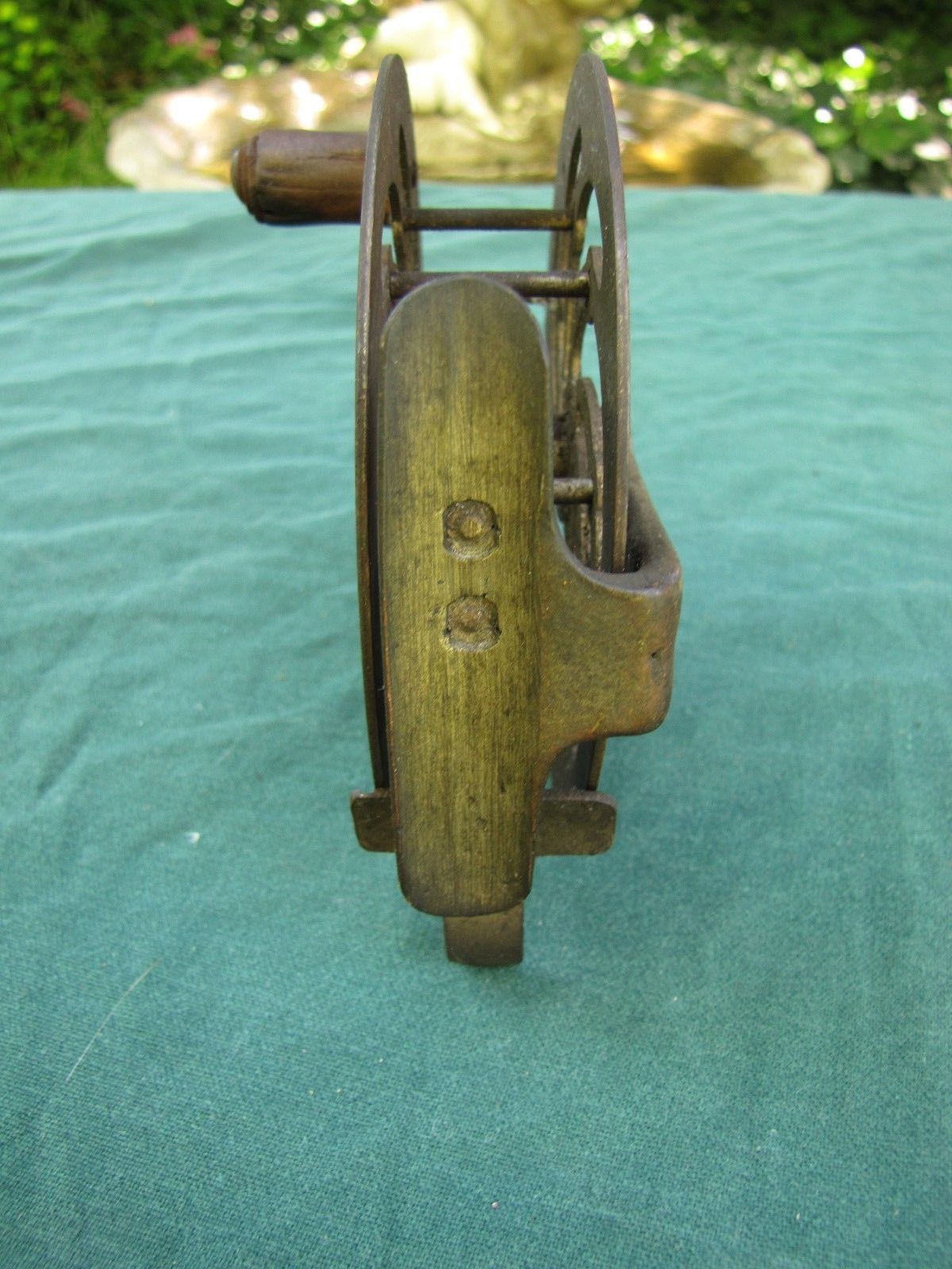 Antique 4 1/2" Fishing Reel With No Maker On it.