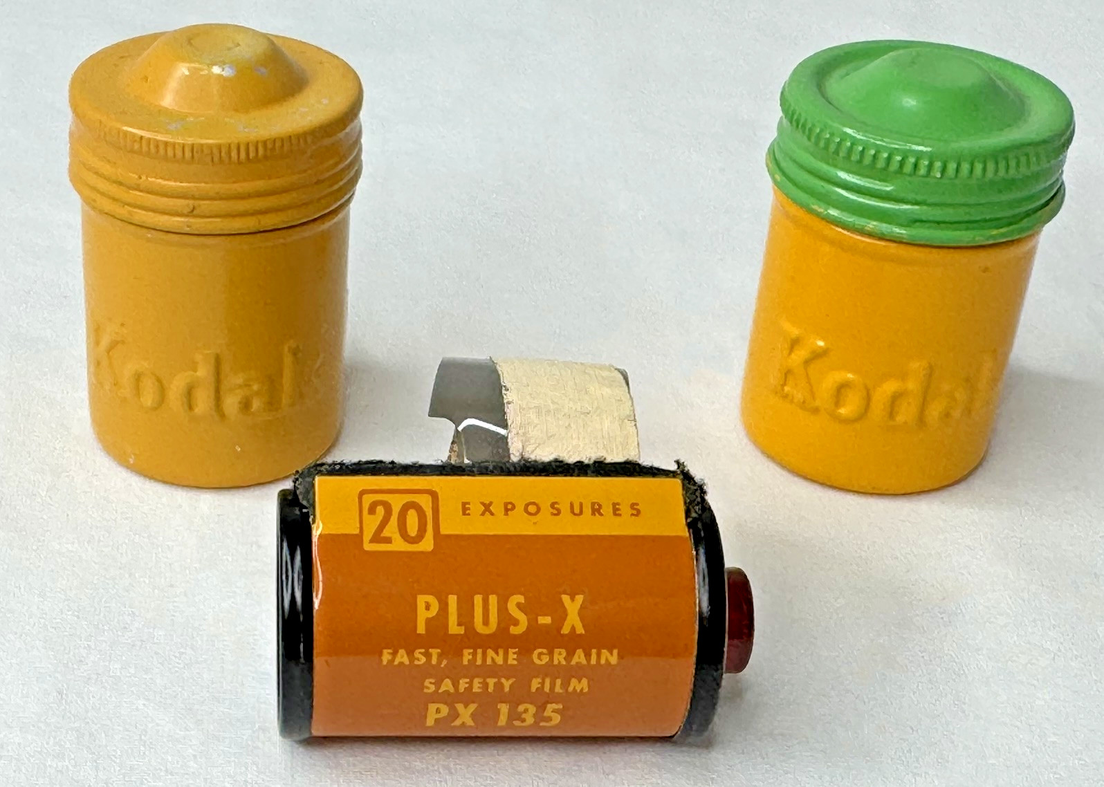 Lot of VTG 2 Kodak Empty Green Yellow Metal 35mm Canisters & PLUS-X PX 135 Film