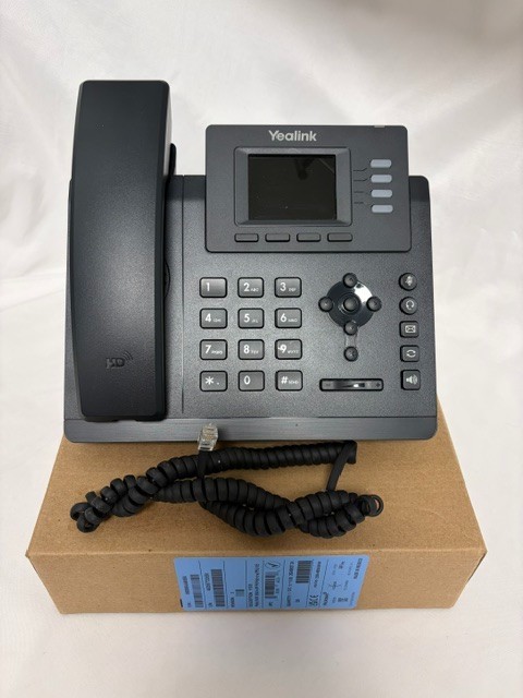 Yealink SIP-T33G Business IP phone featuring a 2.4-inch color display