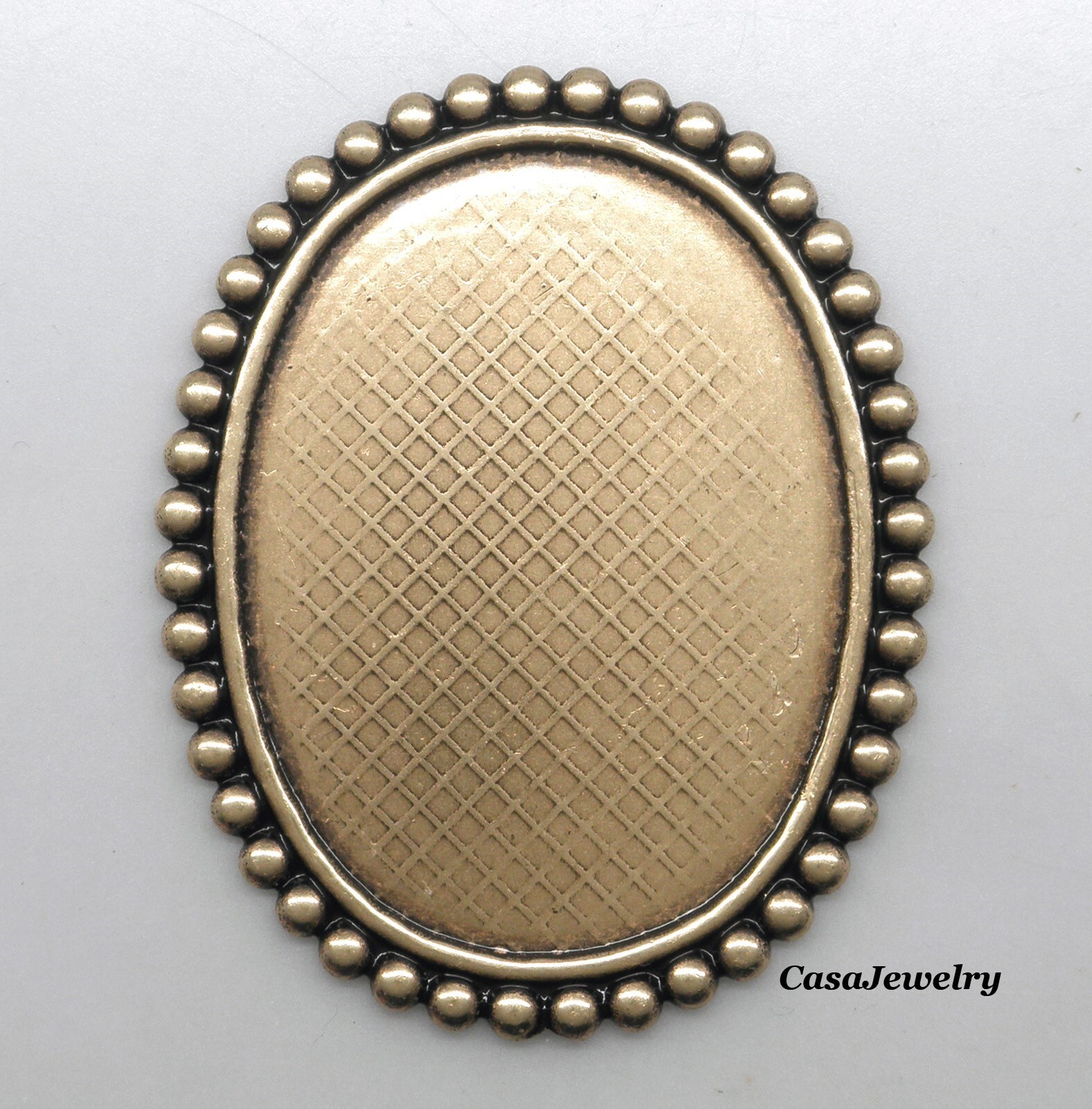 #1830NR ANTIQUED GOLD 40X30 BEADED BORDER BEZEL - 1 Pc