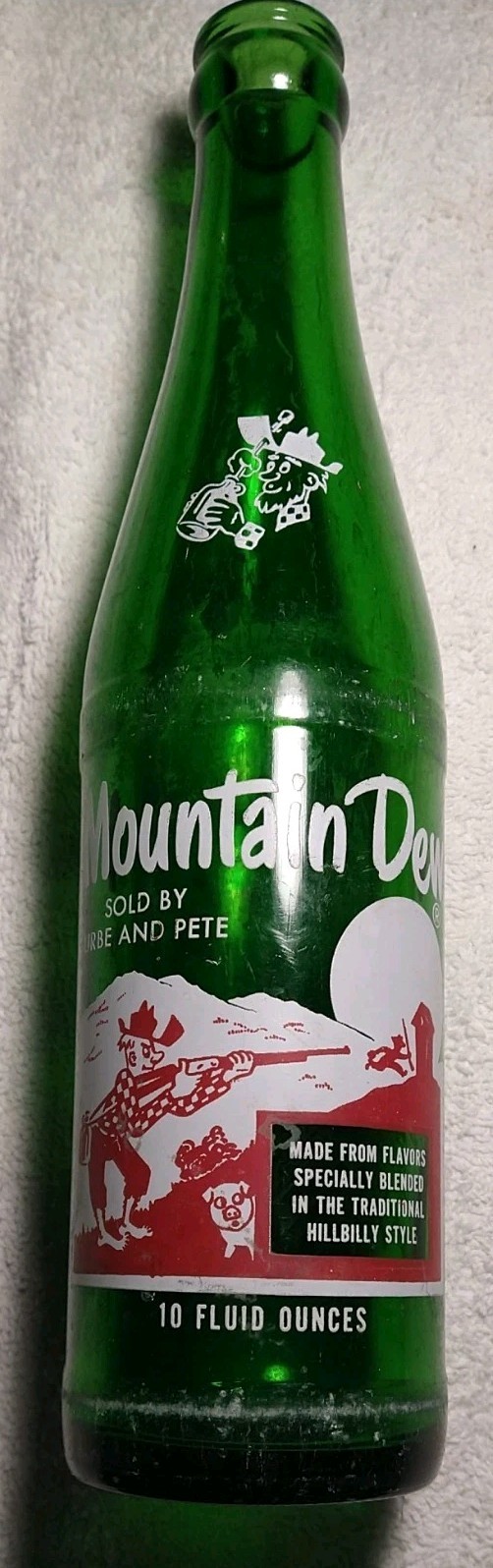 Vintage* Mountain Dew -ACL- "SOLD BY URBE & PETE"  bottle - Empty 10oz.