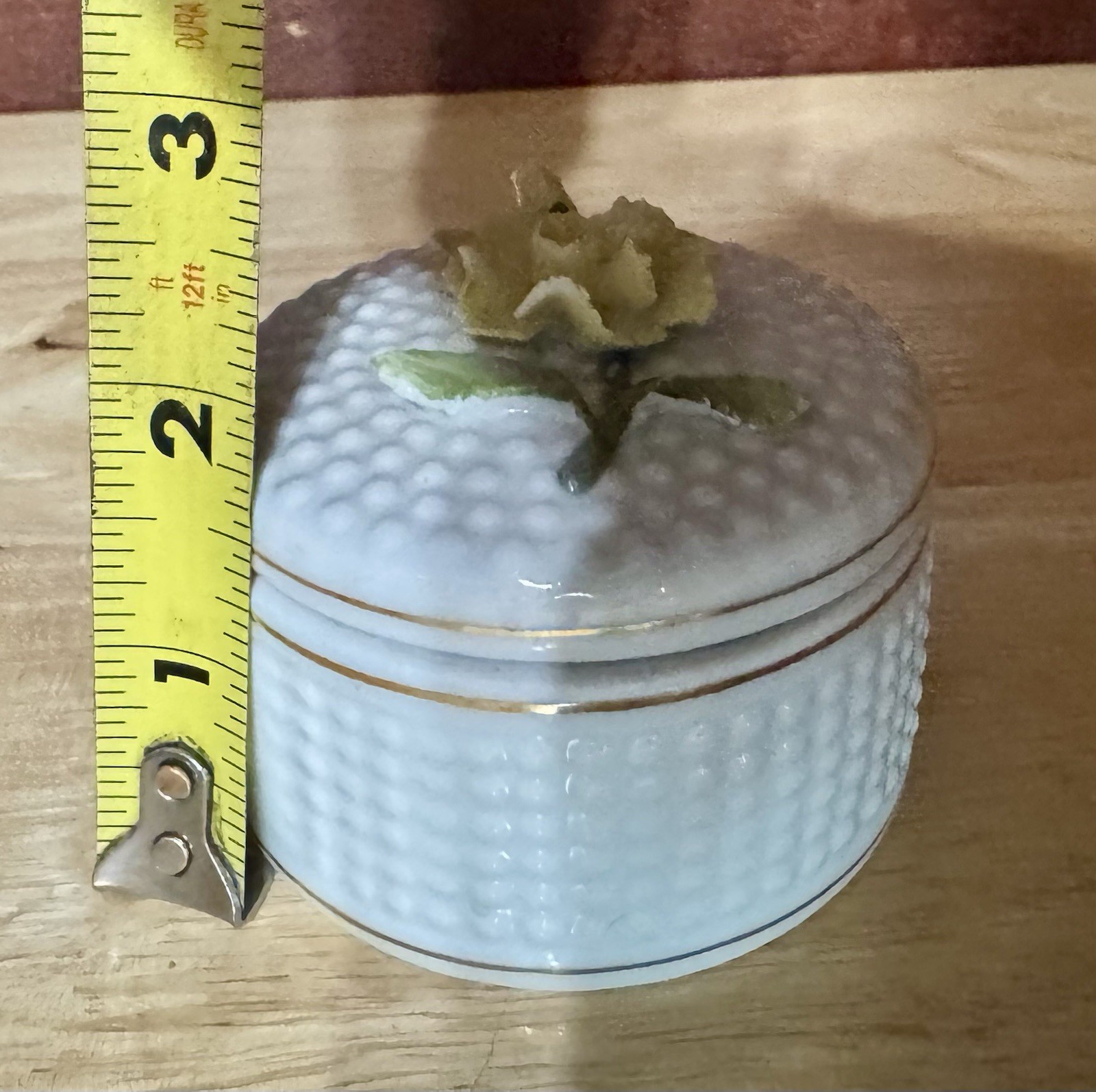 Trinket Box w/ A textured, dotted surface decorated w/ yellow flower; Germany