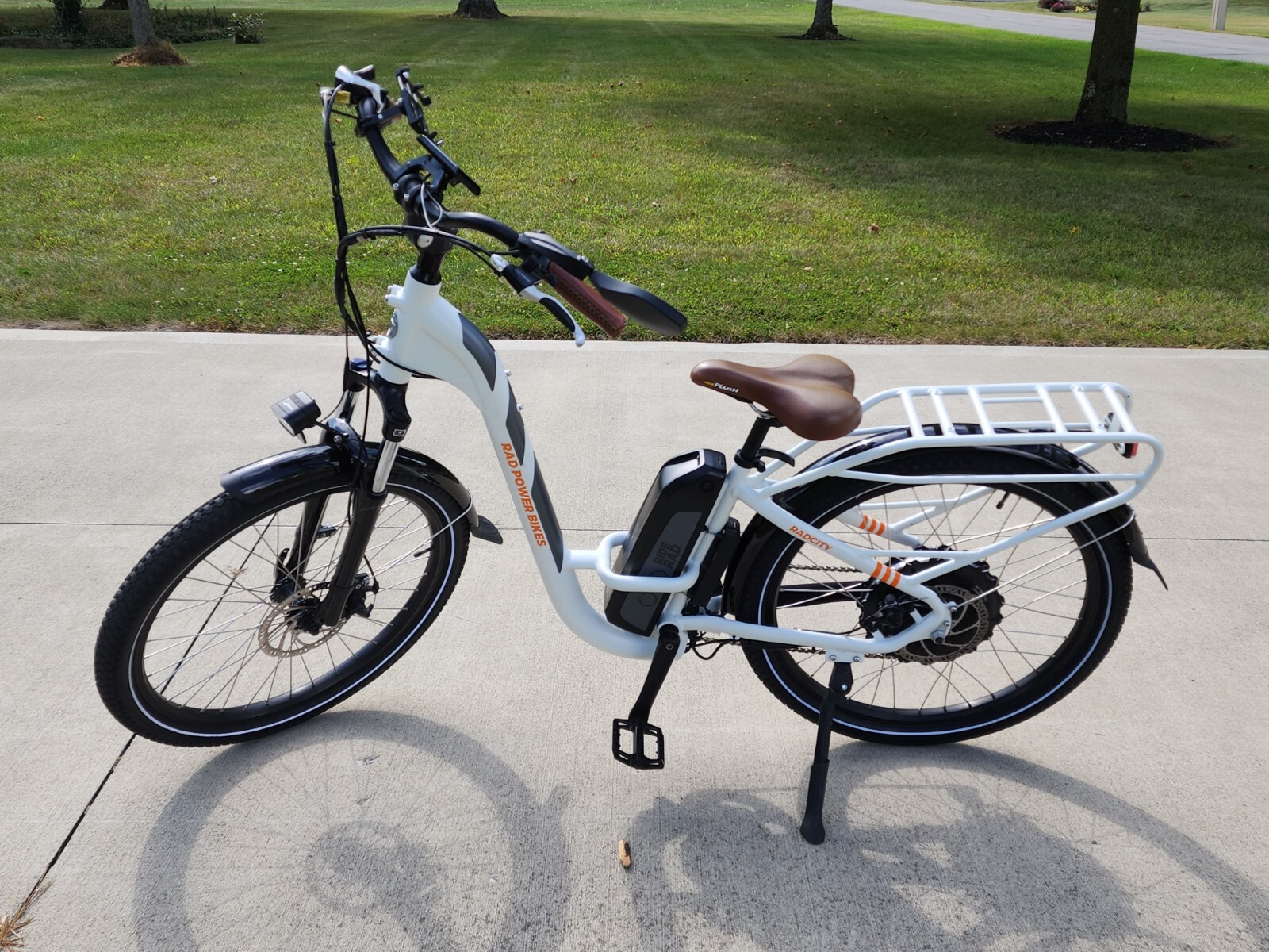 His and Hers RadCity4 Bikes - Virtually NEW! Includes Carrier, Cover, Misc