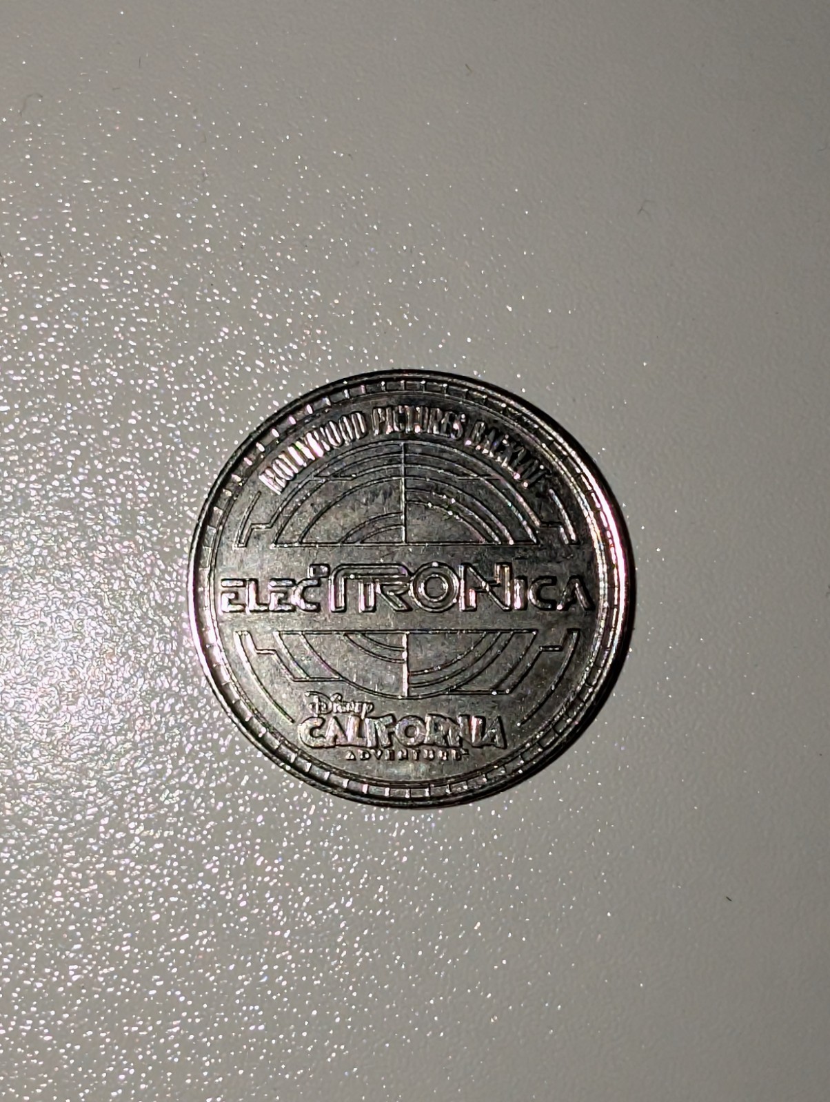 Flynn's Arcade Electronica Tron Coin Disney California Adventure 2011 Silver