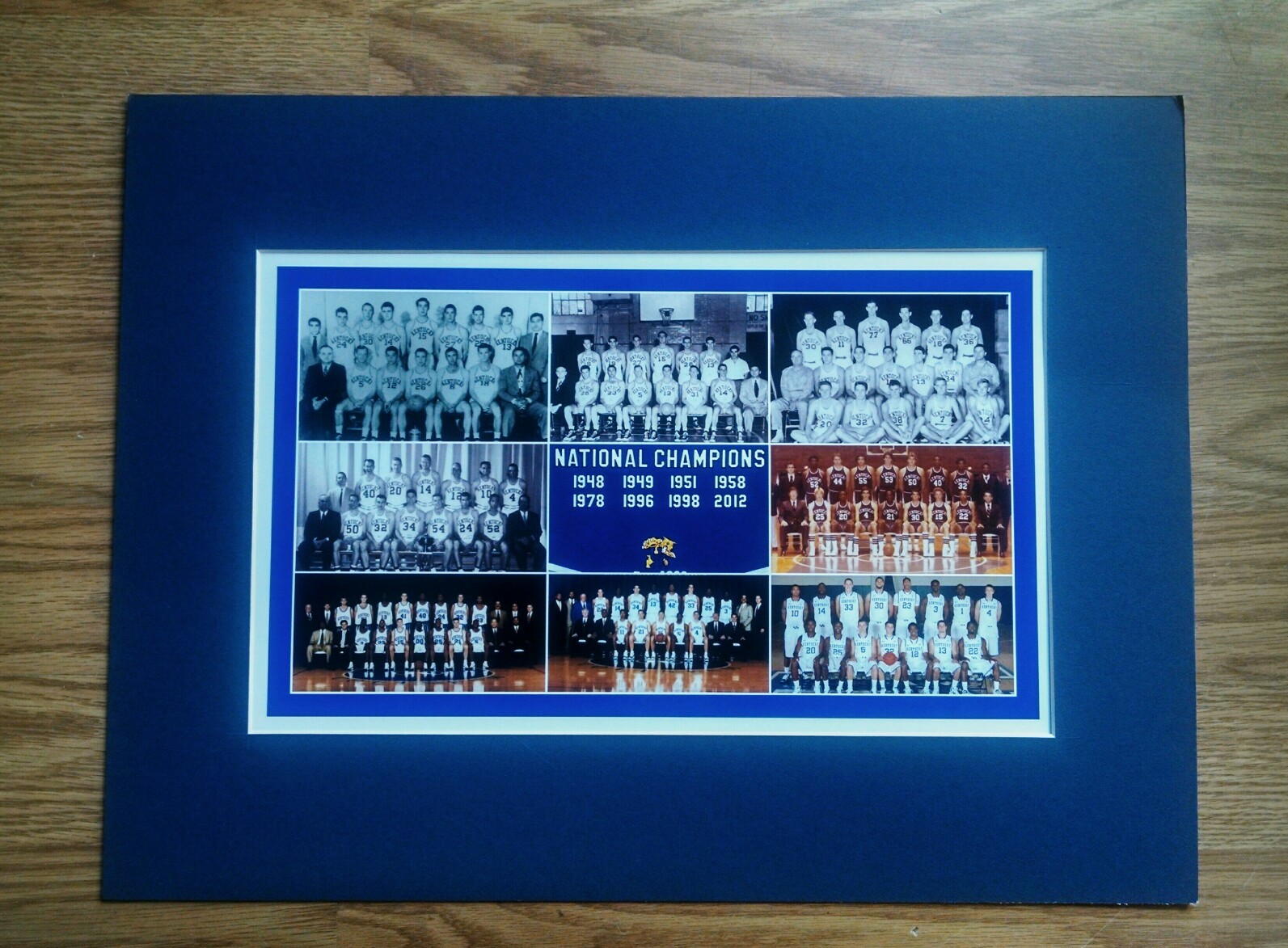 KENTUCKY WILDCATS MATTED PHOTO OF ALL 8 NCAA BASKETBALL CHAMPION TEAMS