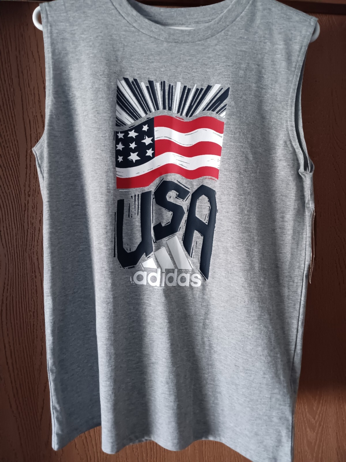 NWT ADIDAS BOYS GREY XL ( 18-20)..SLEEVELESS SHIRT ( USA) ADIDAS ..BRAND NEW...