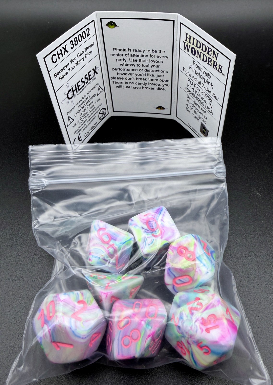 Chessex 38002 Hidden Wonders Festive Pinata / pink Polyhedral 7 Dice Set