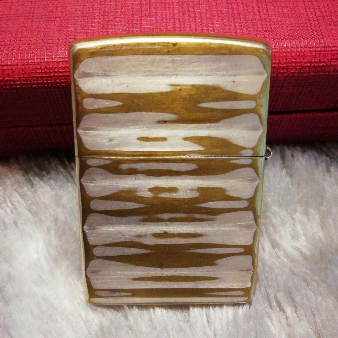 Zippo lighter, double-sided design, made in 2002.