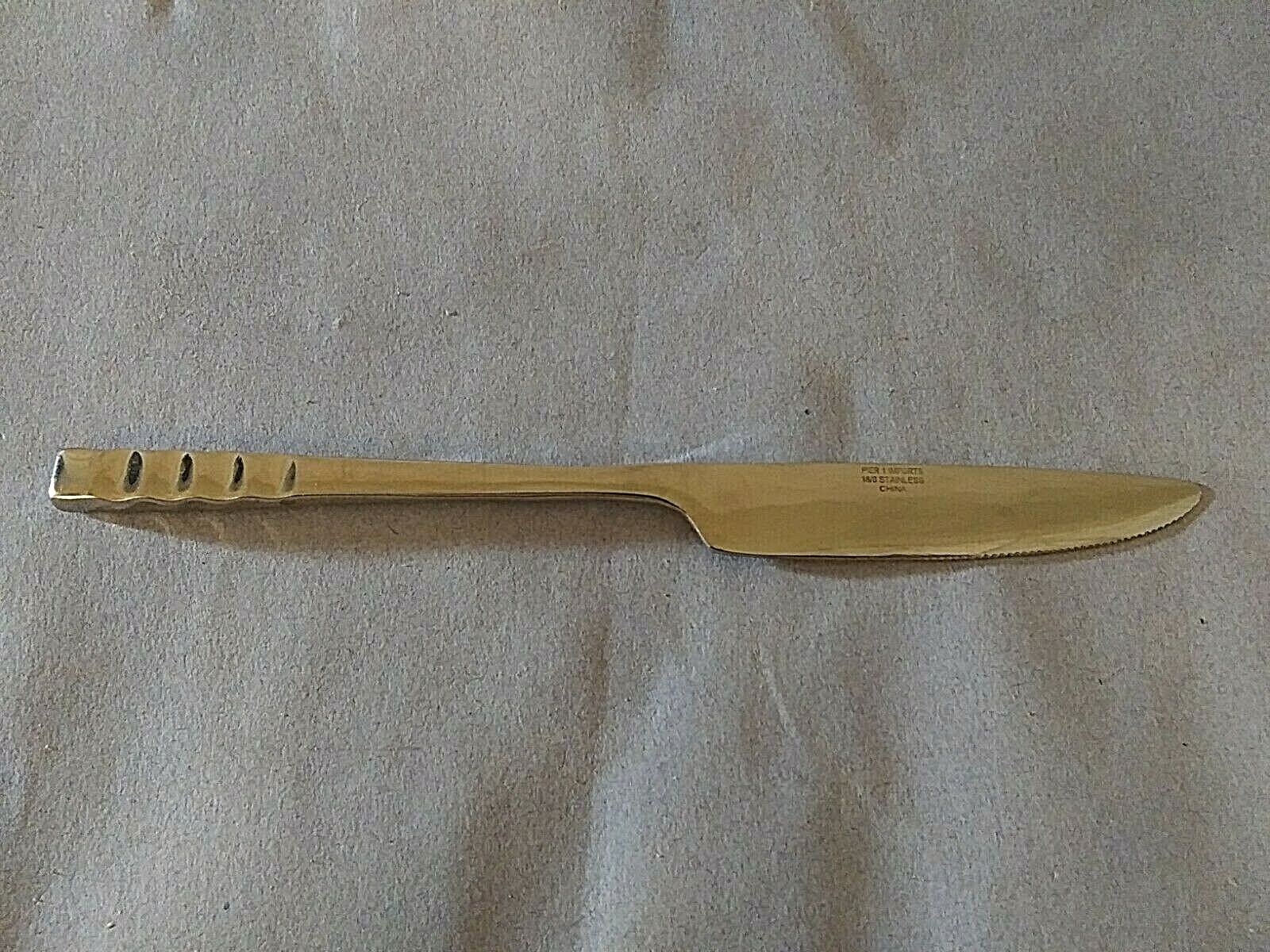 Pier 1 Wavy stainless 9" solid handle dinner knife
