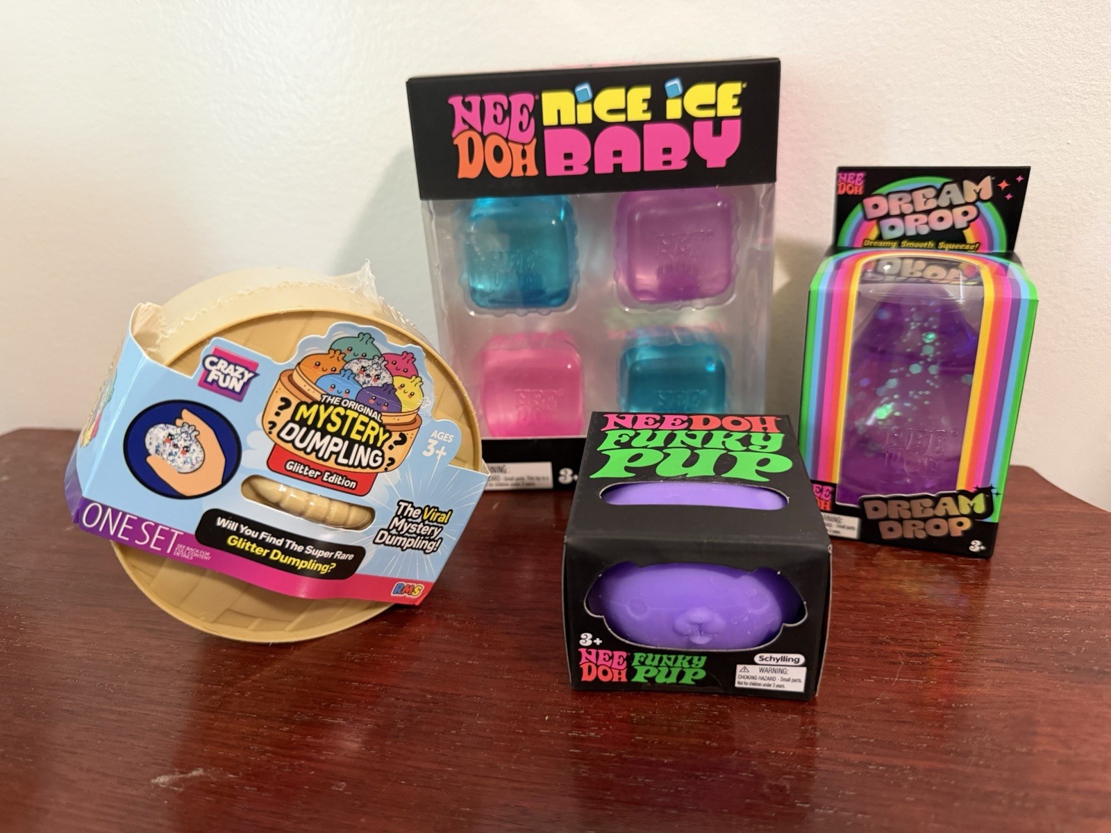 NeeDoh and Dumpling Bundle! New Unopened 4 Piece Bundle New In Box