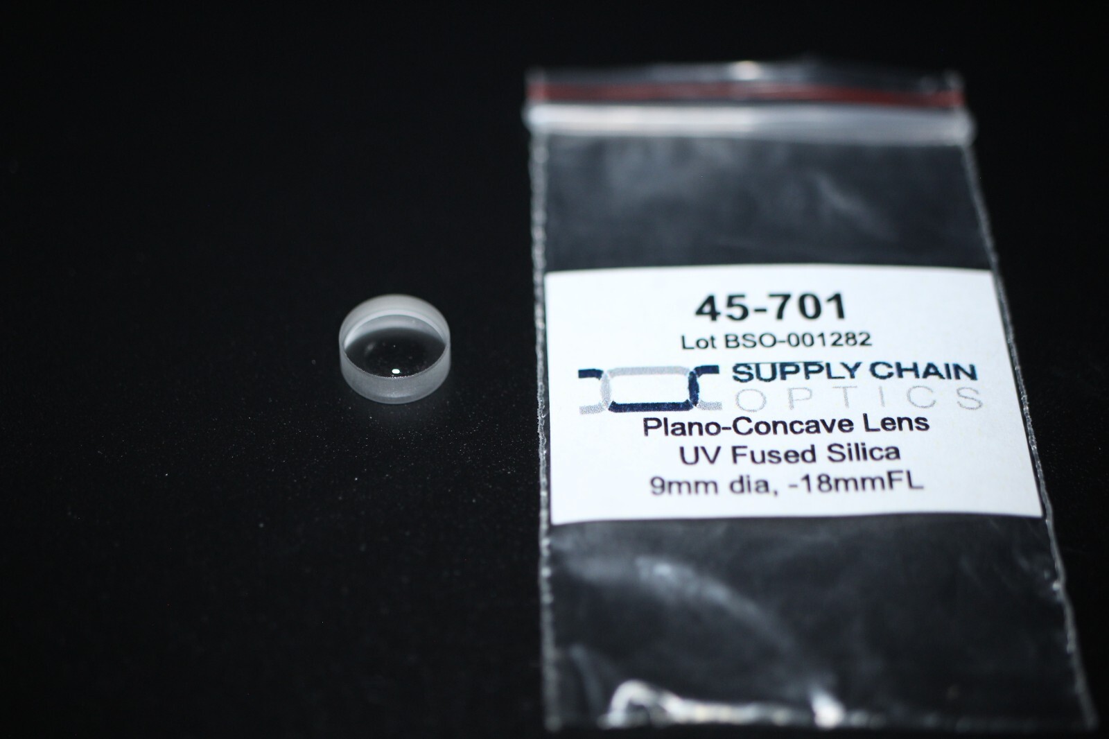 45-701 UV Fused Silica Plano Concave Lens, 9mm diameter, -18mm focal length