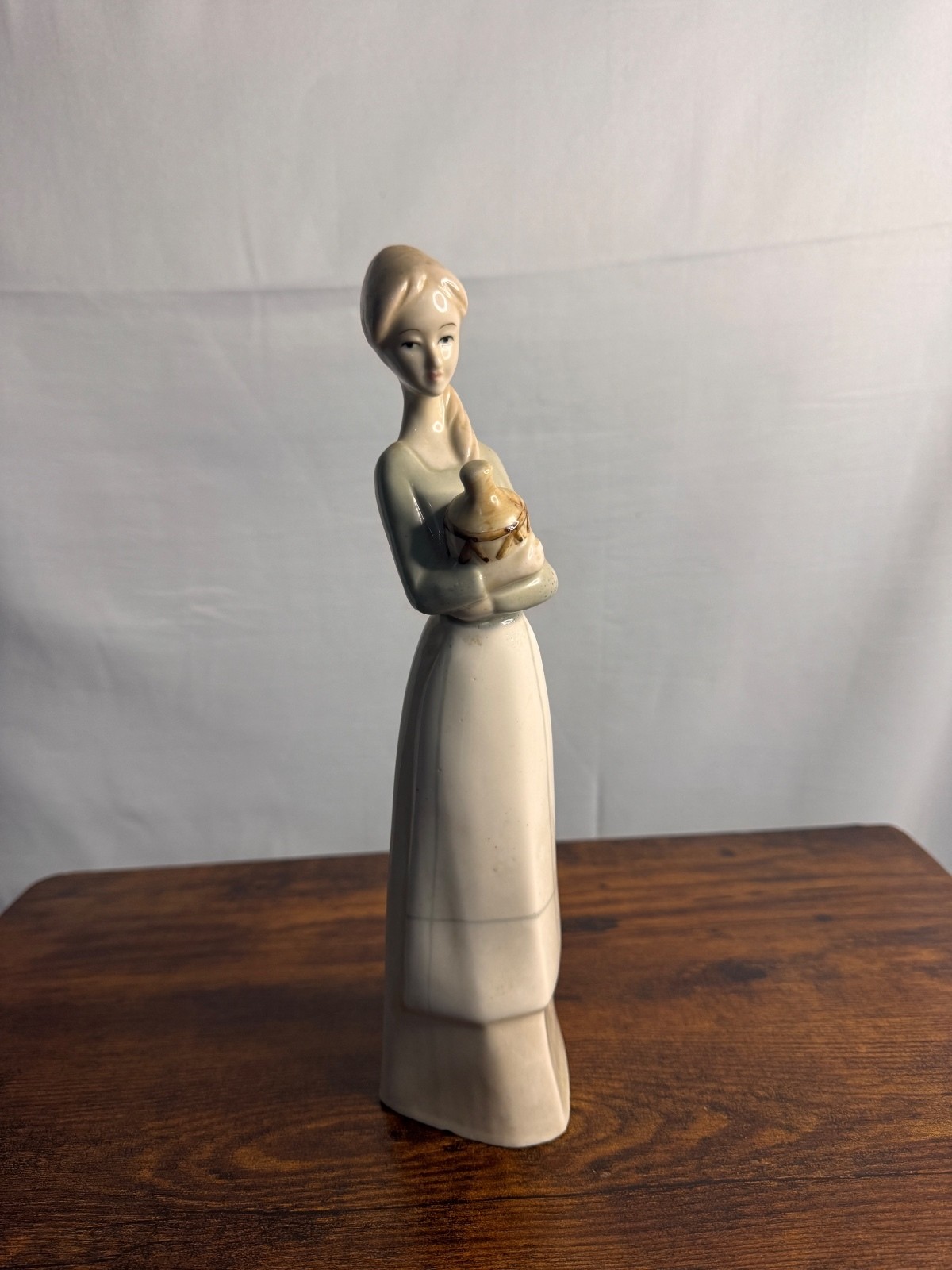 Vintage 1978 Ron-Mart Ceramic Lady Holding Jar Figurine Hand Painted Art Pottery