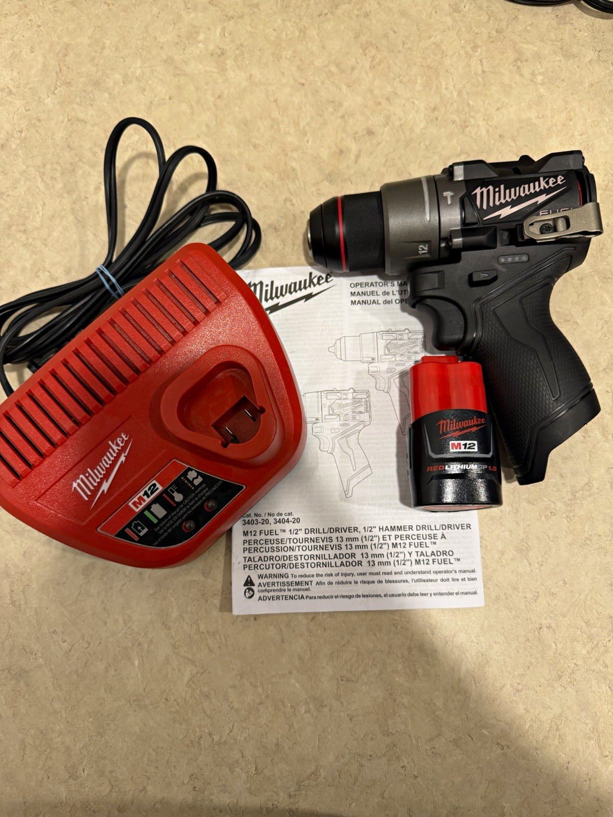 New Milwaukee M12 FUEL 12V 1/2in Hammer Drill (Blackout) W/1.5 Btry & Chrgr
