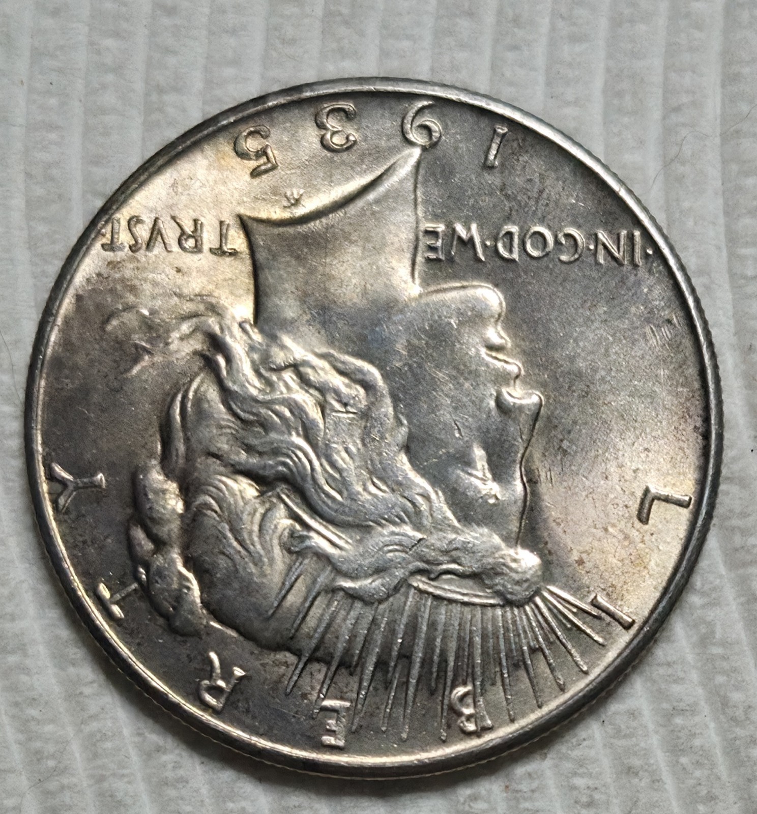 1935 P Peace Silver Dollar. Estimated Almost Uncirculated 58. A0989.