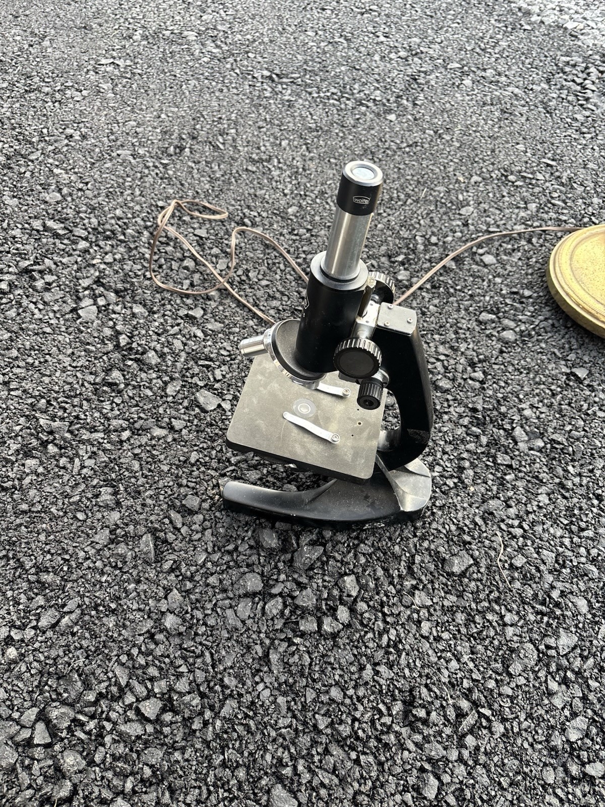 This is a vintage Wolfe student microscope likely imported from Japan,