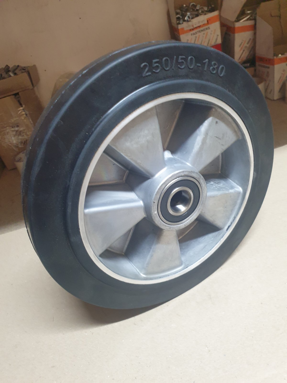 Aluminum wheel with rubber