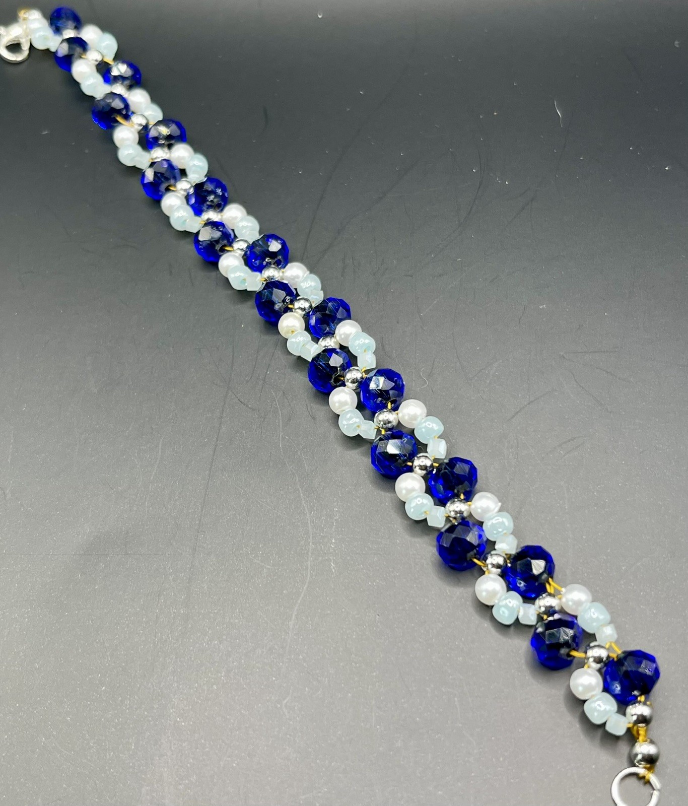 Handmade Beaded Bracelet.  Blues and white.