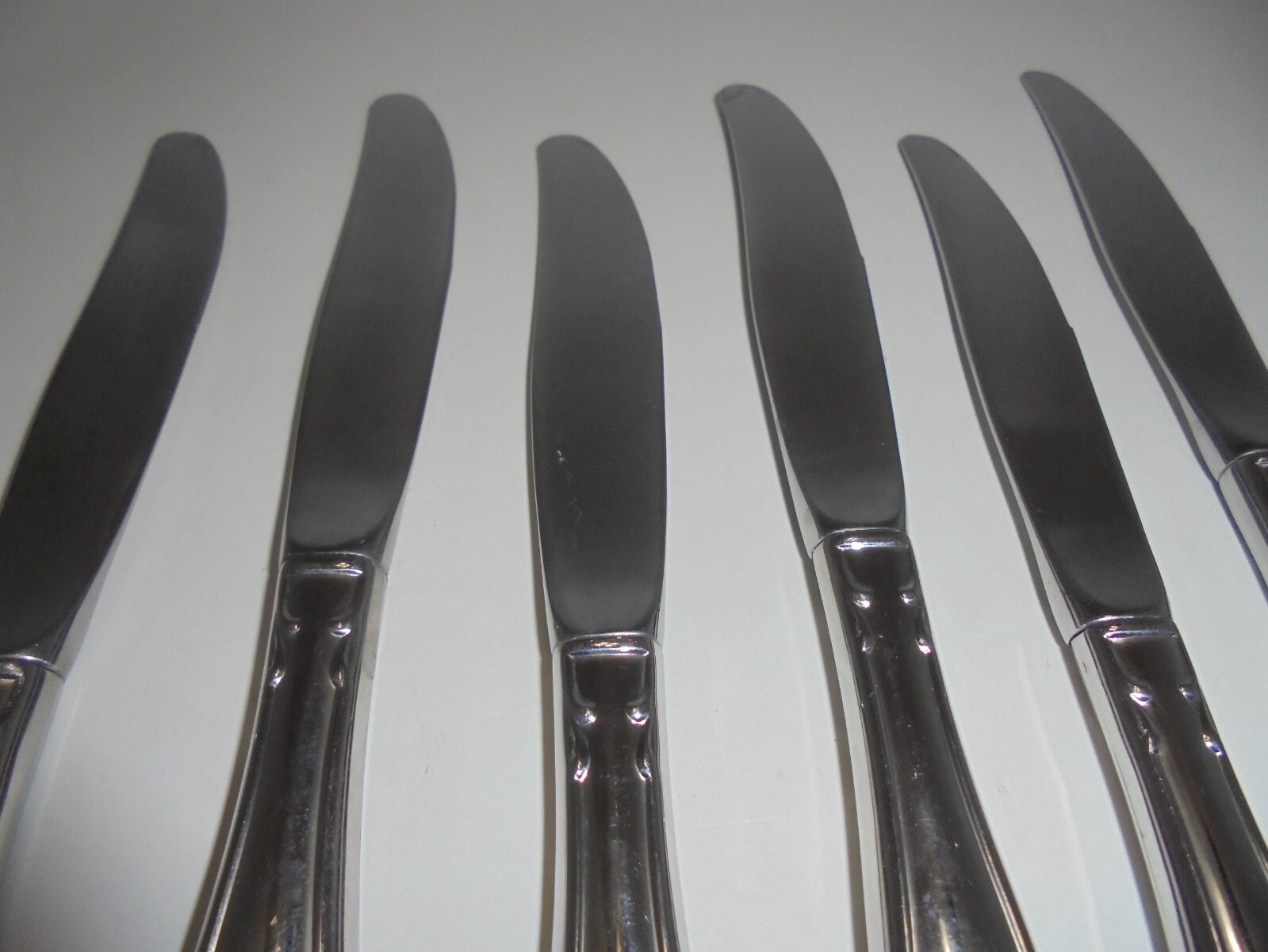 6 Oneida Community Stainless Chatelaine Dinner Knives