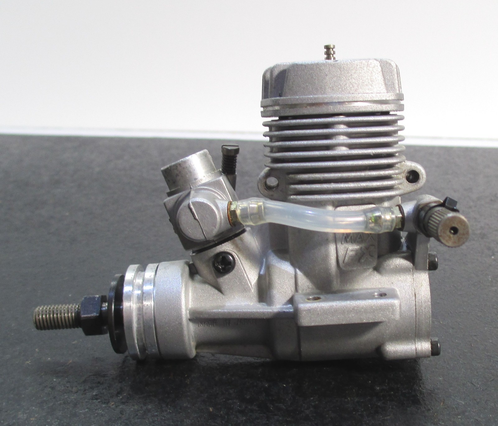 O.S. MAX-25FX 4.07cc 2-Stroke Glow Engine Includes muffler; used for RC airplane