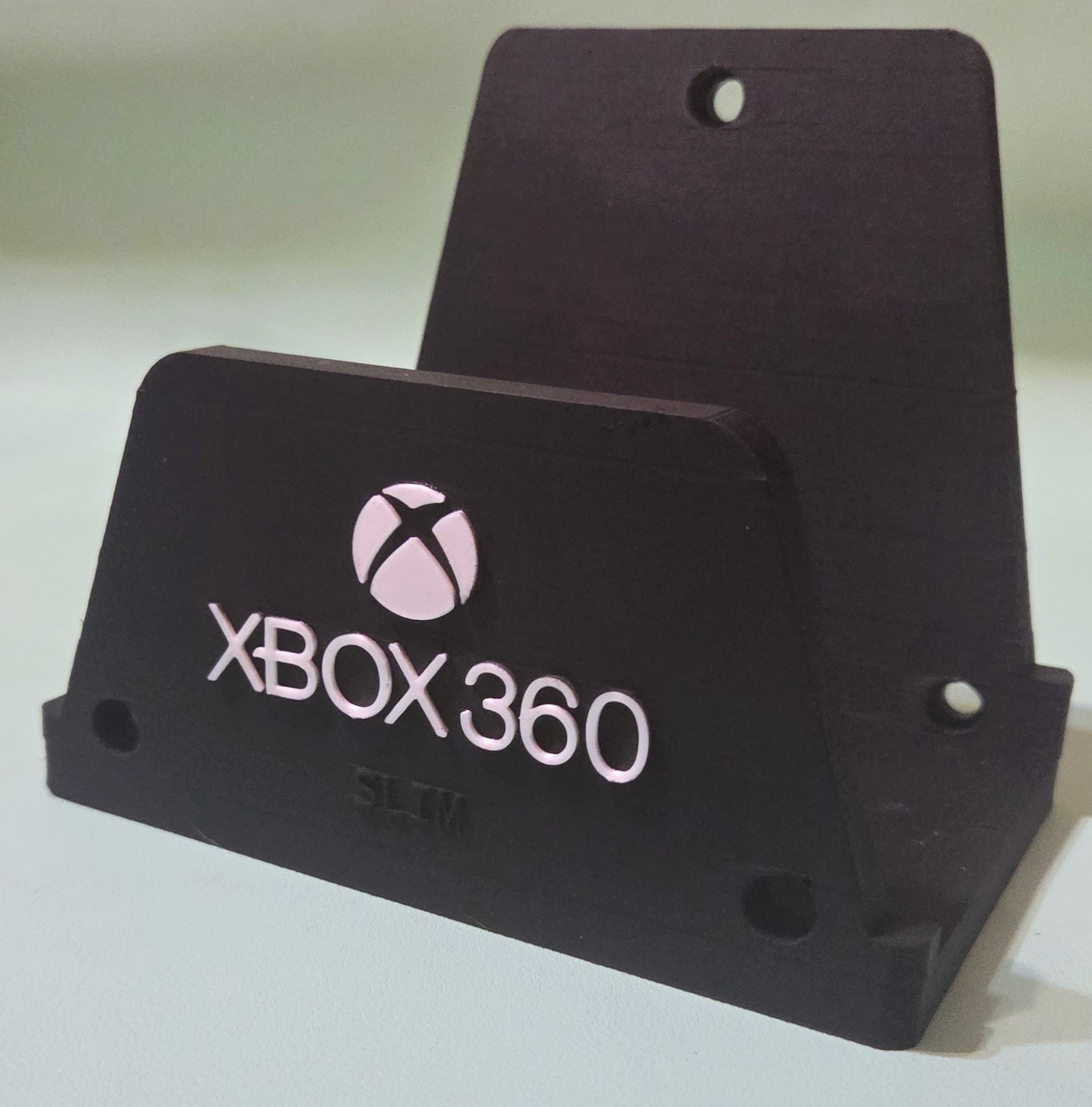 Xbox 360 Slim Wall Mount- w/ Power Adapter Wall Mount- Includes Hardware.