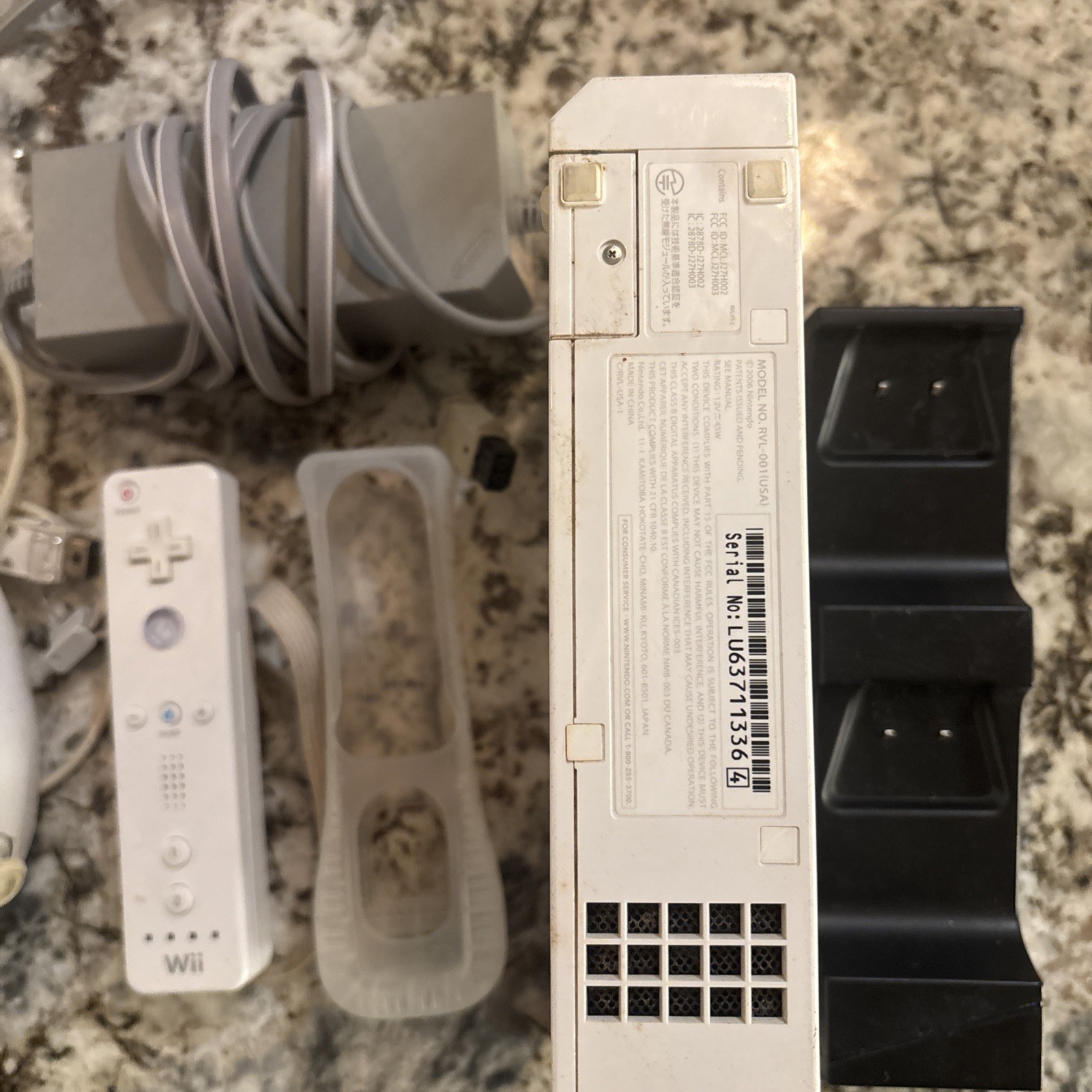 White Wiii Console with 2 Controllers. power corD & RCA