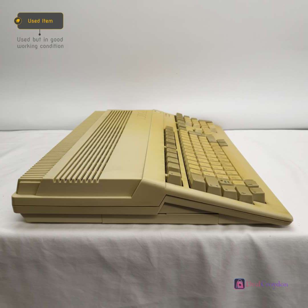 COMMODORE AMIGA A500 COMPUTER +COMMODORE A520 +MOUSE + 10 DISKS + POWER SUPPLY