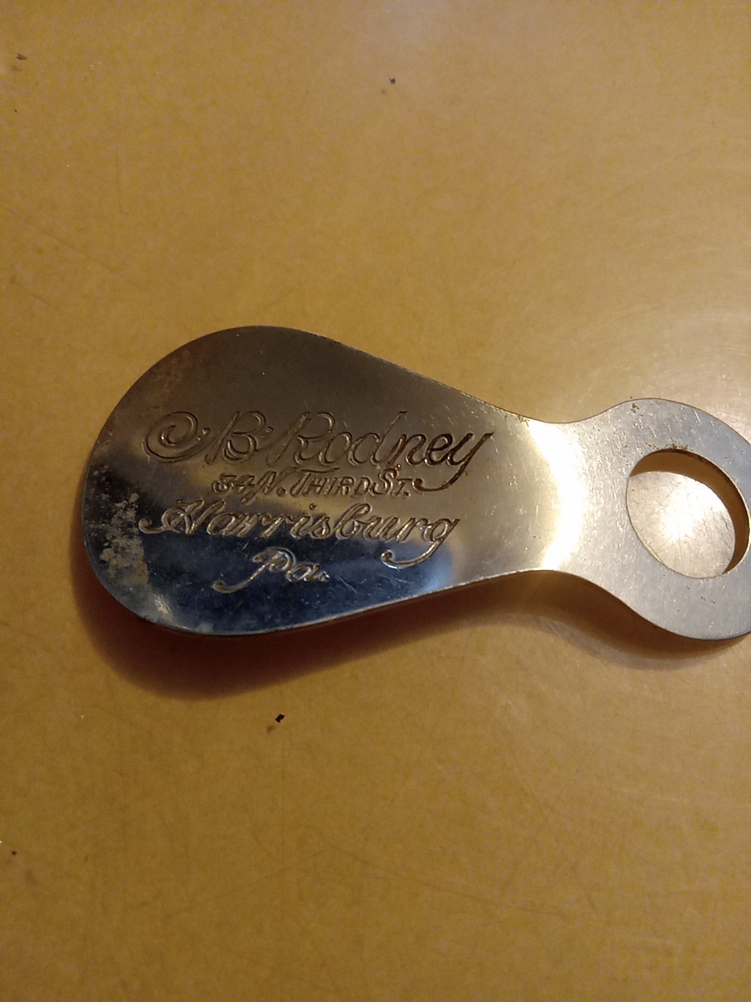 Vintage metal advertising shoe horn: B. Rodney 34 N. Third St. Harrisburg, PA