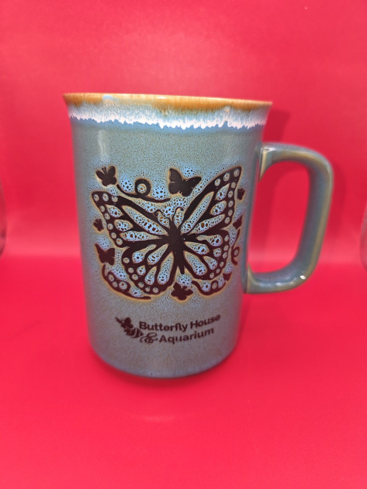 ceramic coffee mug from the Butterfly House & Aquarium, (N)
