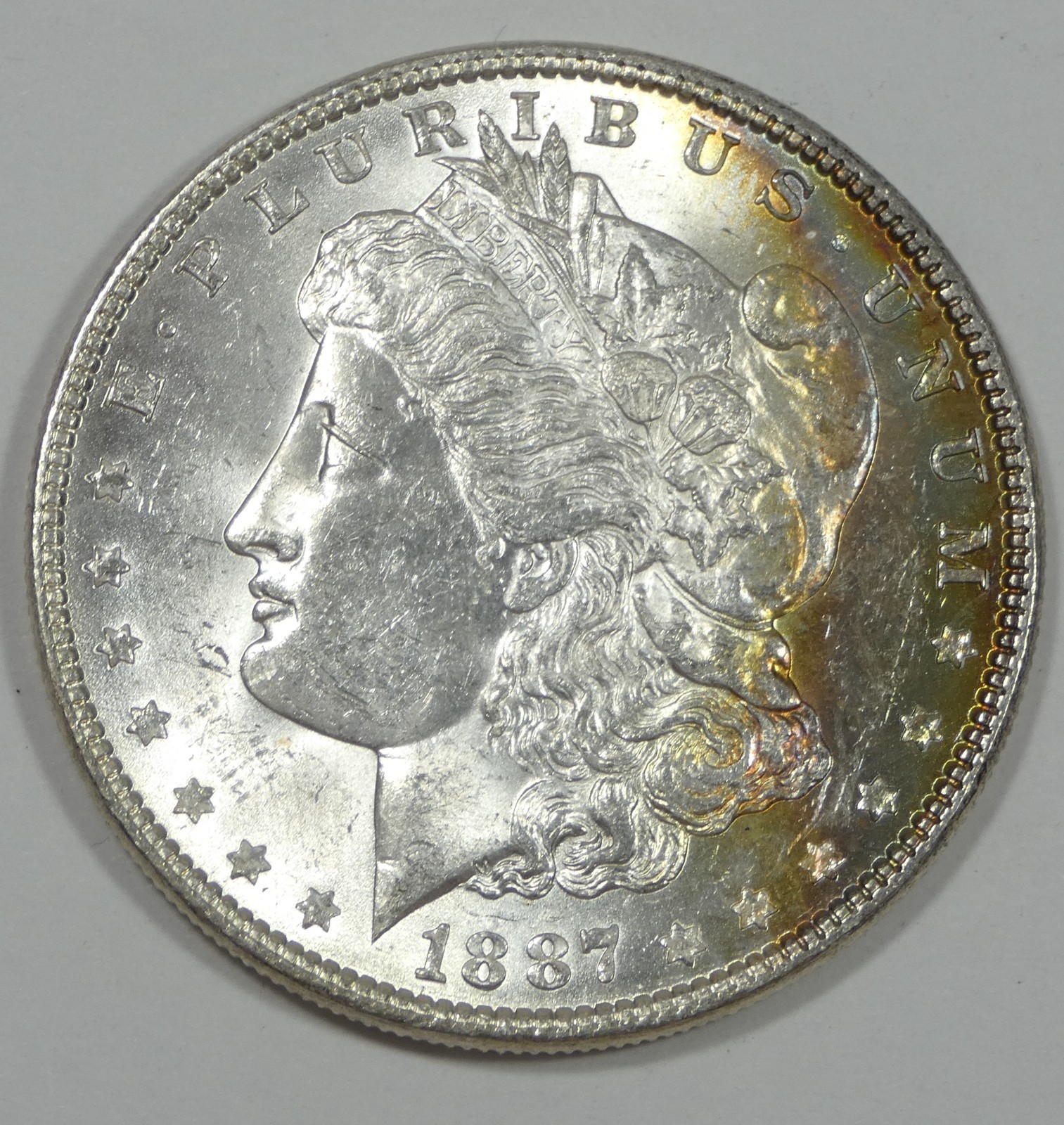 1887 Morgan Silver Dollar Nice BRILLIANT UNCIRCULATED ~ Obverse Rainbow Tone