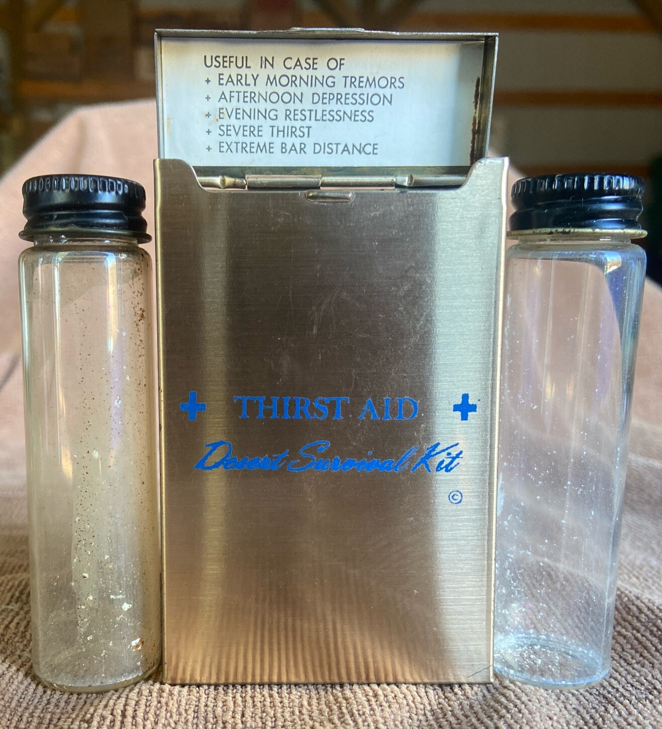 VINTAGE GOLD TONE THIRST AID DESERT SURVIVAL KIT METAL ALCOHOL CONTAINER. @@@@@@