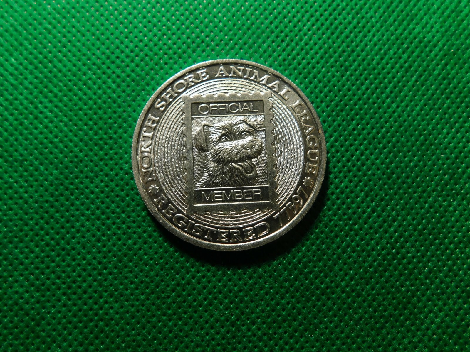NORTH SHORE ANIMAL LEAGUE TOKEN!   a491UXX